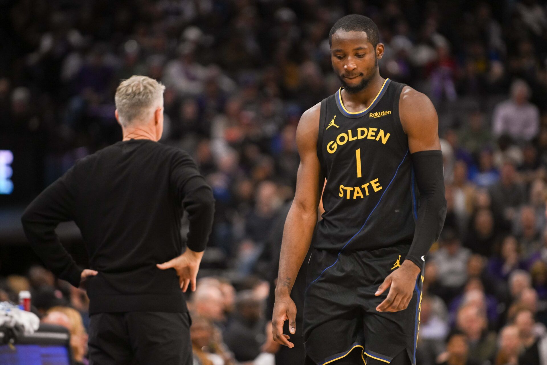 Golden State Warriors forward Jonathan Kuminga (1) walks off the court after being removed from the game during the fourth quarter of the game against the Sacramento Kings at Golden 1 Center.