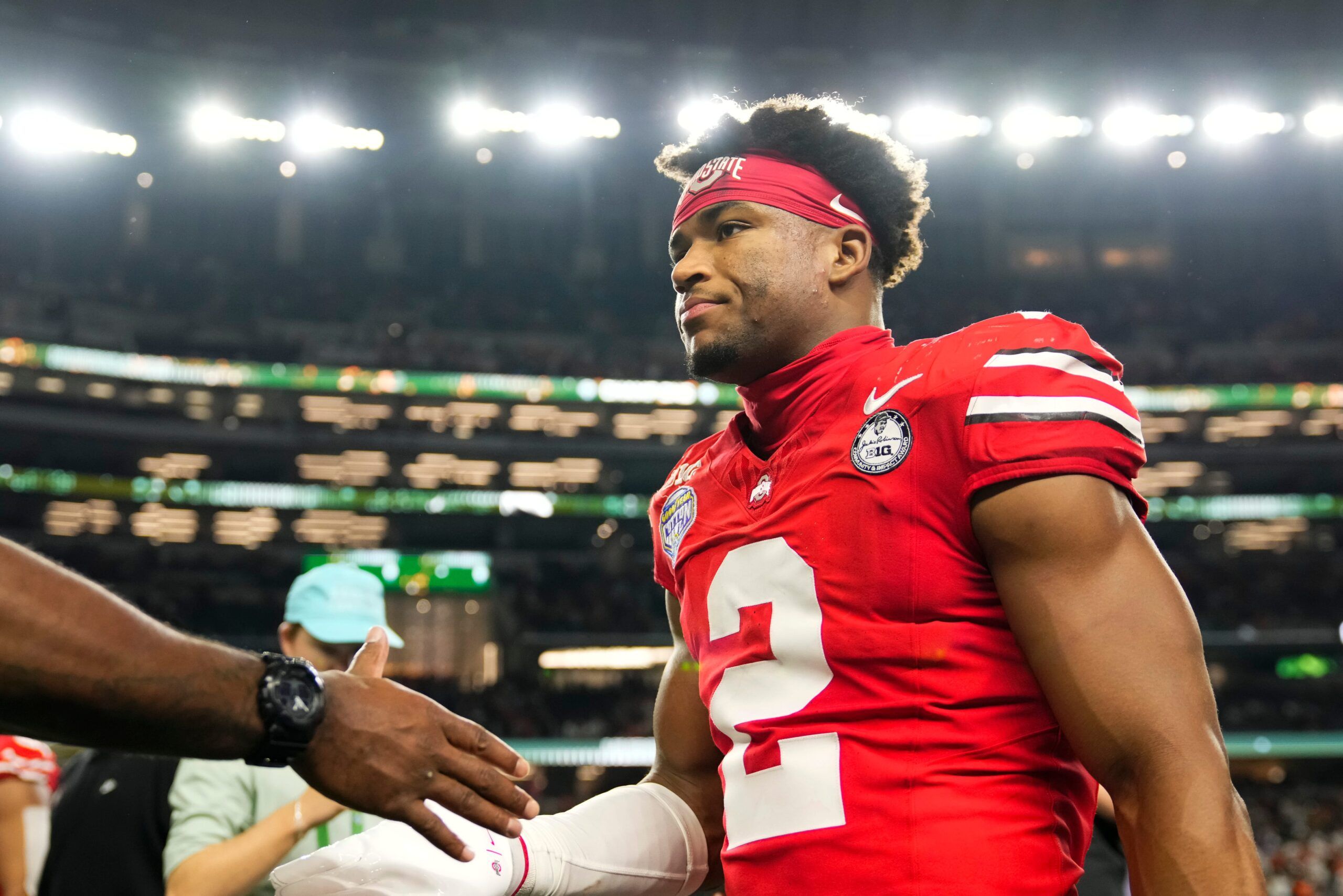 Ohio State Buckeyes defensive back Caleb Downs (2) leaves the field following the Cotton Bowl at AT&T Stadium in Arlington, Texas for the College Football Playoff quarterfinal game against the Miami Hurricanes on Dec. 31, 2025. Ohio State lost 24-14.