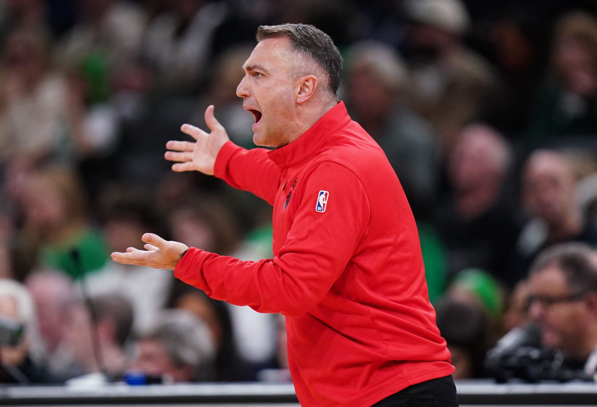 Toronto Raptors head coach Darko Rajakovic watches from the sideline as they take on the Boston Celtics at TD Garden.