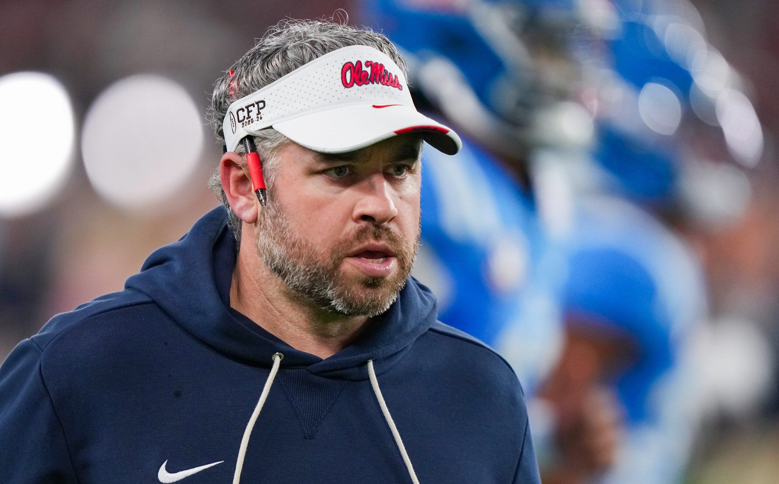 Ole Miss head coach Pete Golding runs off the field during warmups before the CFP Fiesta Bowl at the State Farm Stadium, in Glendale, Ariz., on Thursday, Jan. 8, 2026.