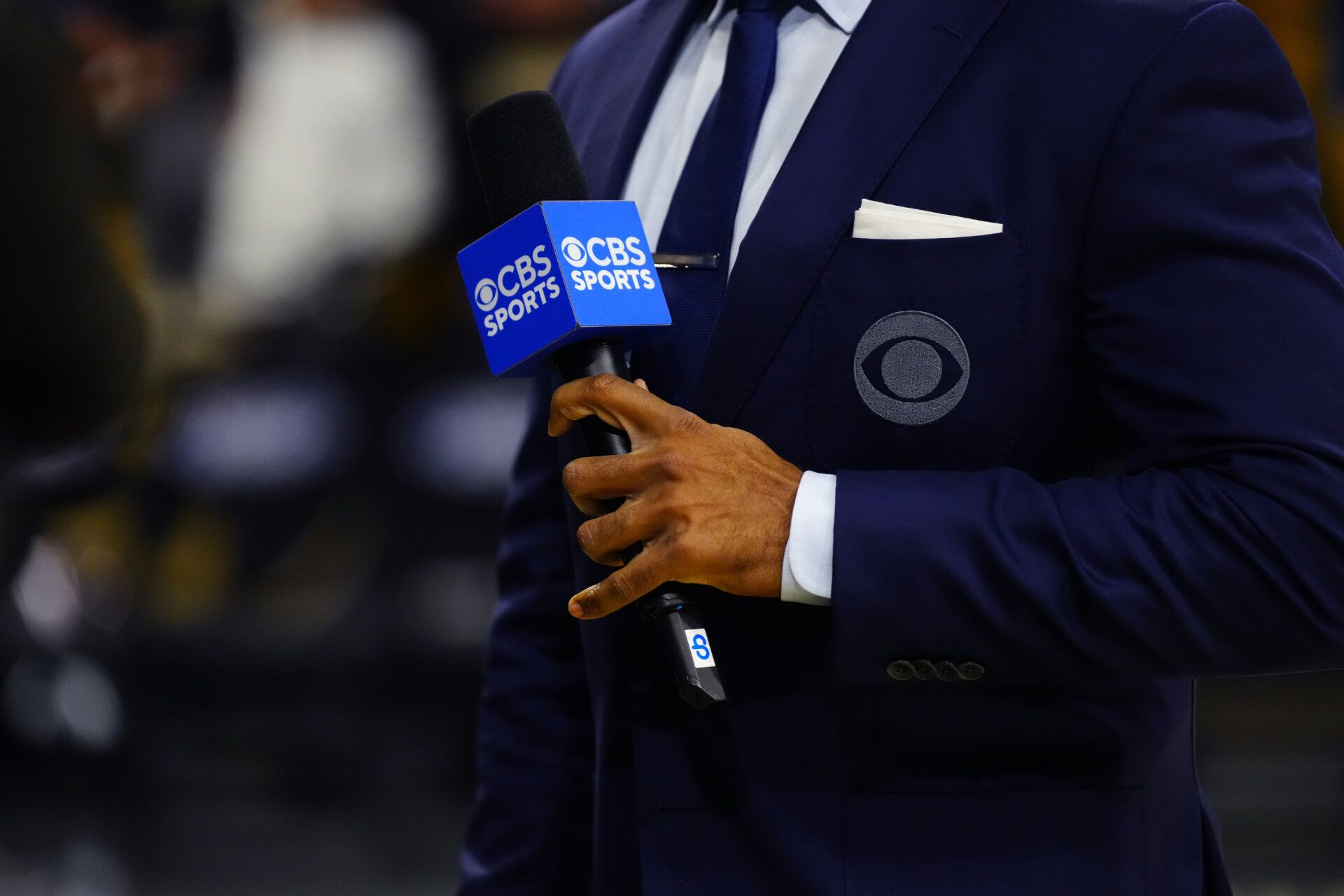 Detailed view of a CBS sport microphone jacket and suit jacket before the game between the Texas Tech Red Raiders against the Colorado Buffaloes at the CU Events Center.