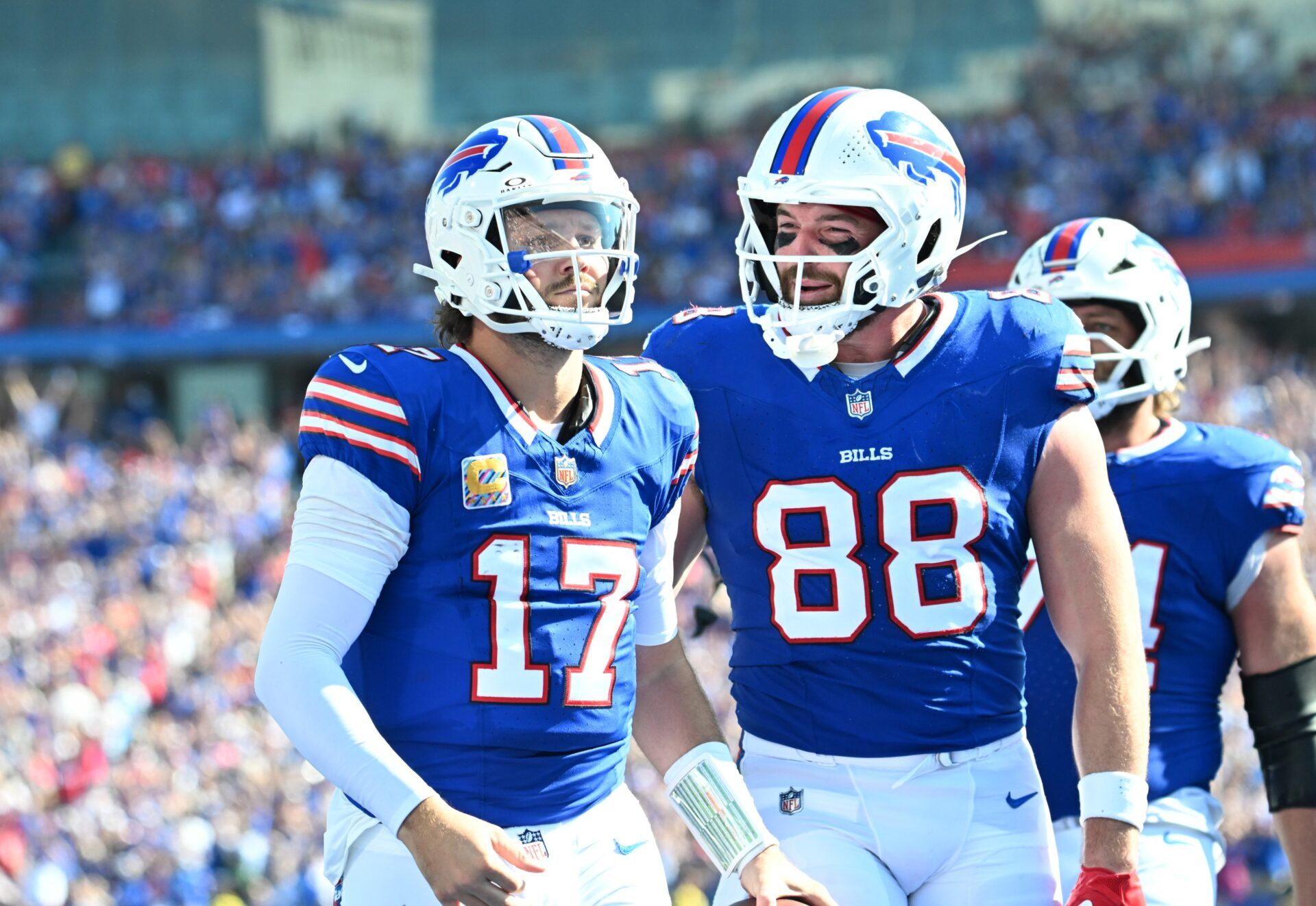 Buffalo Bills quarterback Josh Allen (17) and tight end Dawson Knox (88) react after diving for a touchdown past New Orleans Saints cornerback Alontae Taylor (1) during the third quarter at Highmark Stadium.