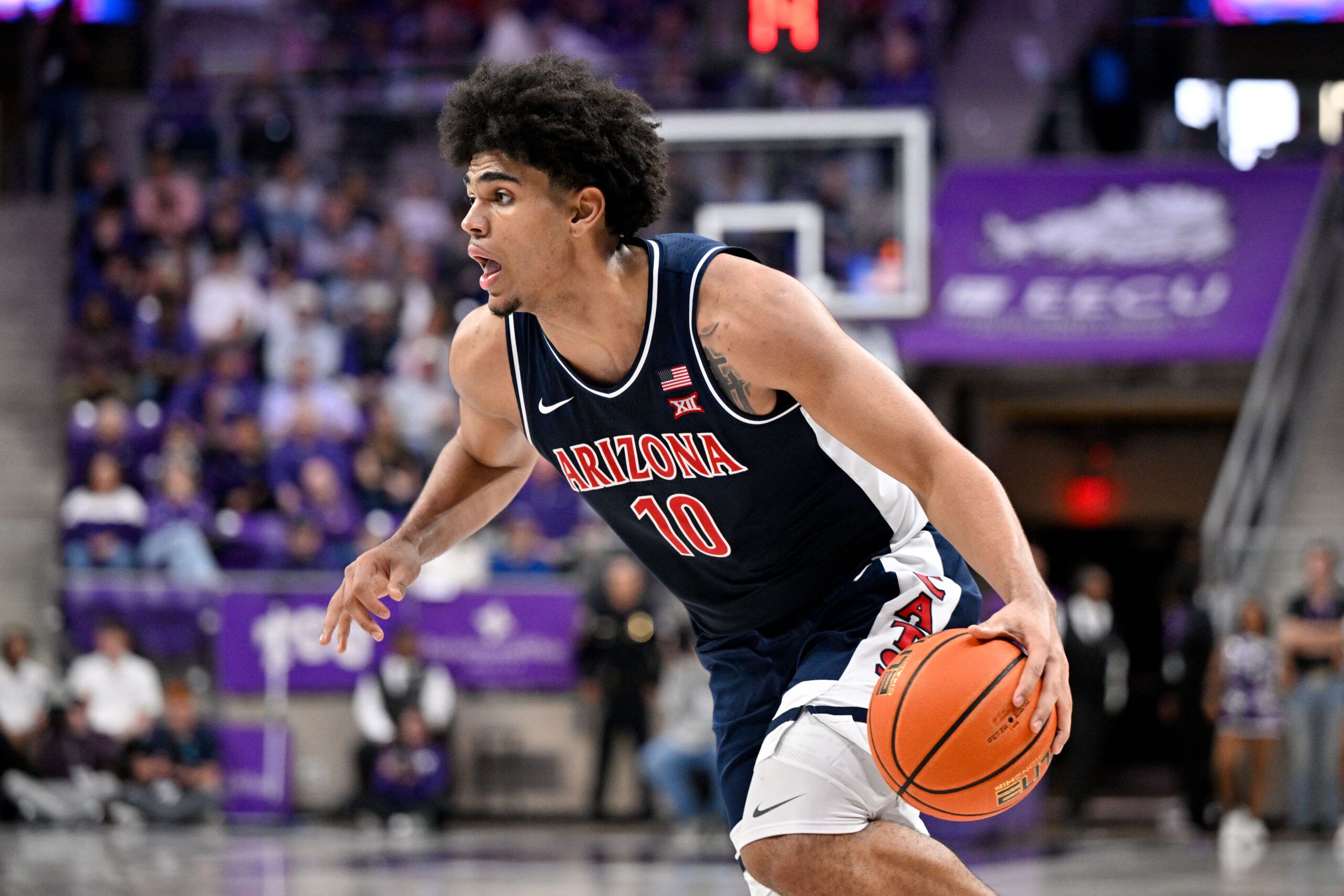 Arizona Wildcats forward Koa Peat (10) brings the ball up court against the TCU Horned Frogs during the second half at the Ed and Rae Schollmaier Arena.