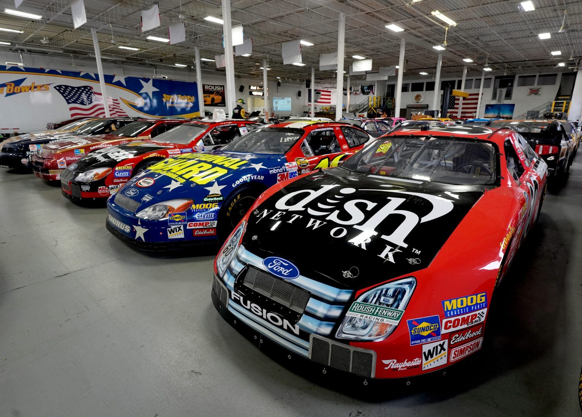 Some of the over 40 NASCAR cars and trucks in the Jack Roush collection inside the 30,000 square foot Roush Automotive Collection in Livonia on Wednesday, August 28, 2024. 
The museum full of Roush Racing race cars, classic Mustangs and other vintage cars is open to the public. It’s a free self guided tour but calling ahead to the museum is encouraged.