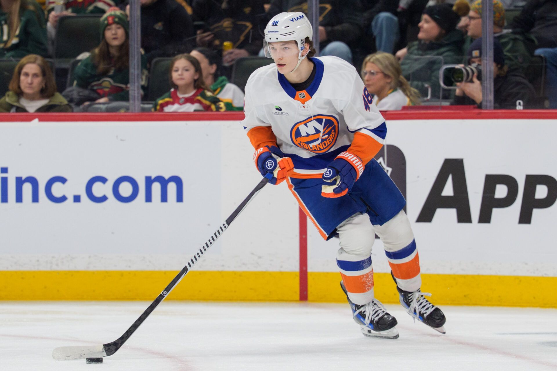 New York Islanders defenseman Matthew Schaefer (48) skates with the puck at Grand Casino Arena.