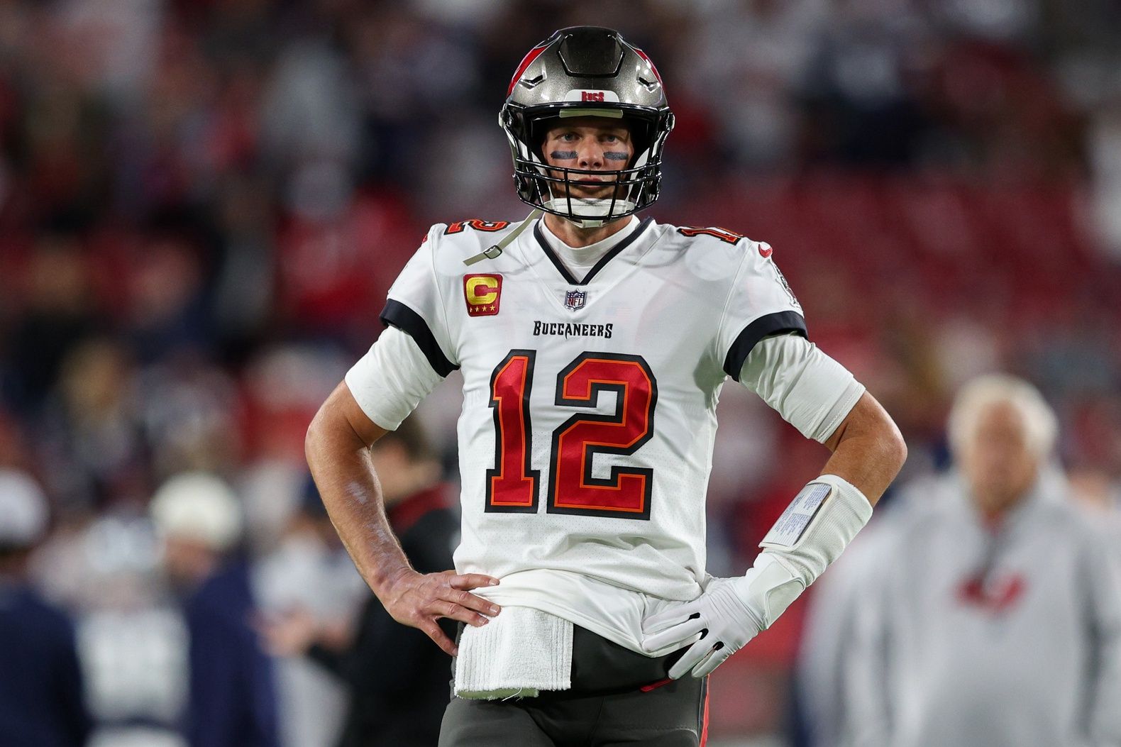Tampa Bay Buccaneers quarterback Tom Brady (12) looks on before a  wild card game against the Dallas Cowboys at Raymond James Stadium.