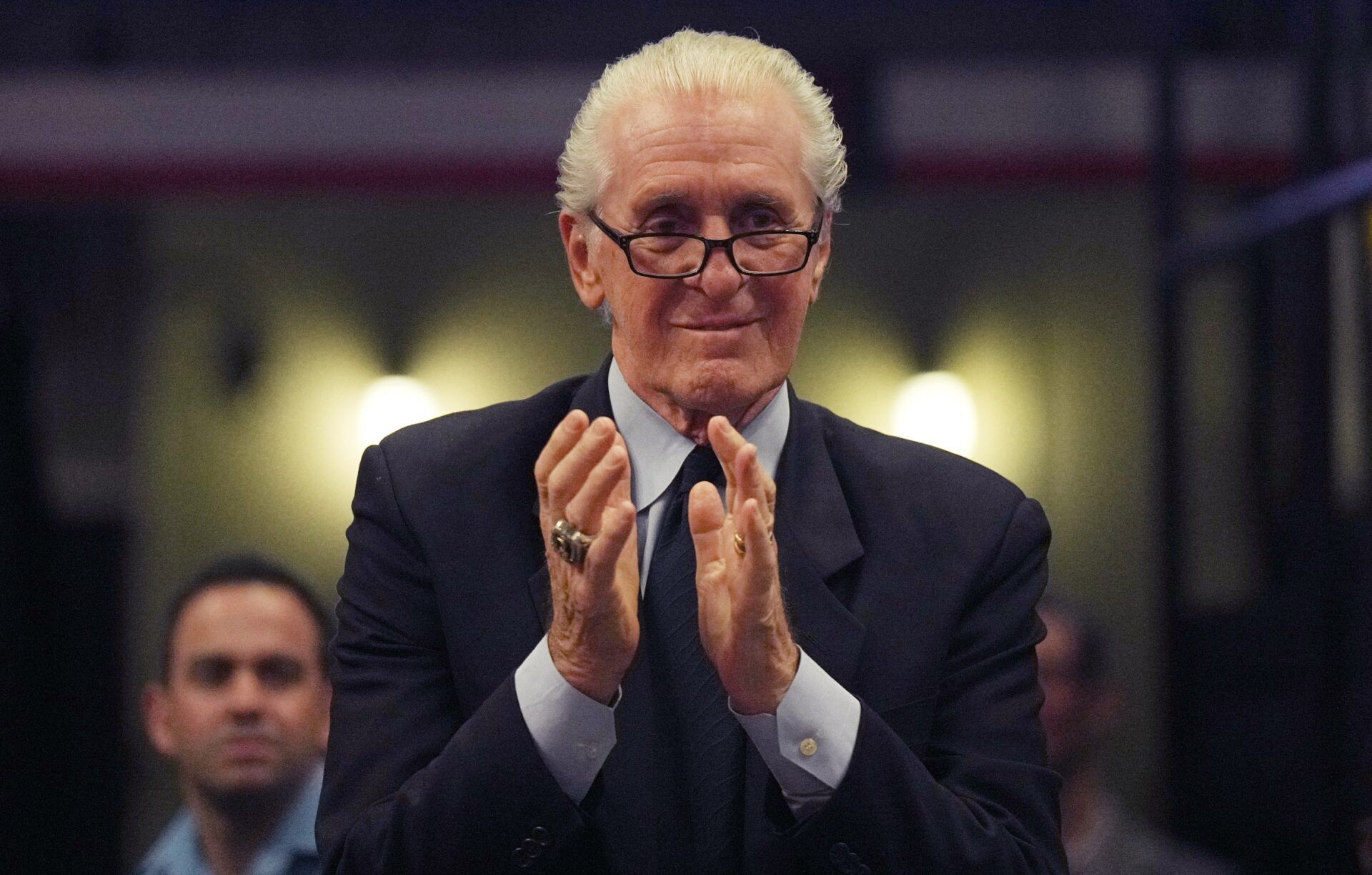 Miami Heat president Pat Riley applauds Chris Bosh during a brief ceremony during the game between the Miami Heat and Atlanta Hawks at Miami-Dade Arena.