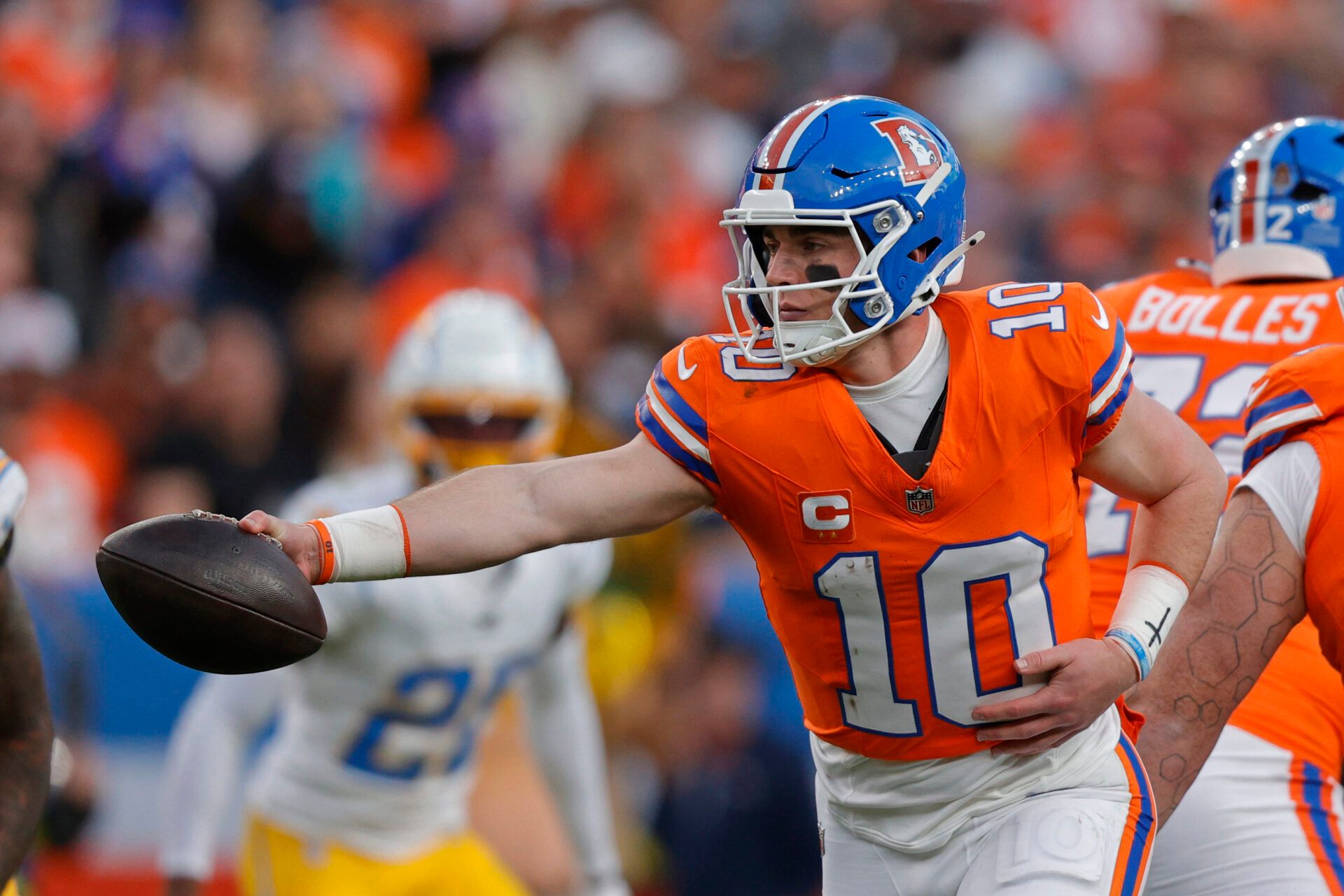 Denver Broncos quarterback Bo Nix (10) passes the ball during the second half against the Los Angeles Chargers at Empower Field at Mile High.