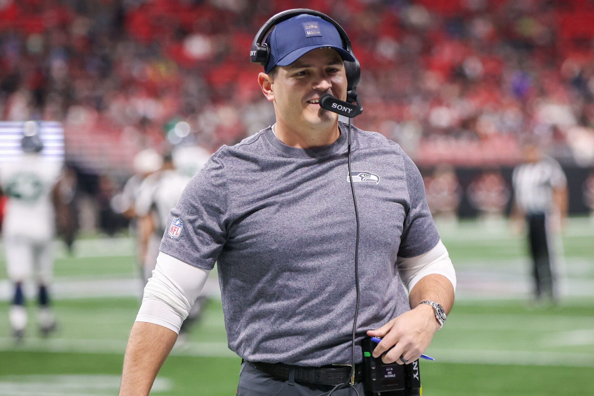 Seattle Seahawks head coach Mike MacDonald on the sideline against the Atlanta Falcons in the fourth quarter at Mercedes-Benz Stadium.