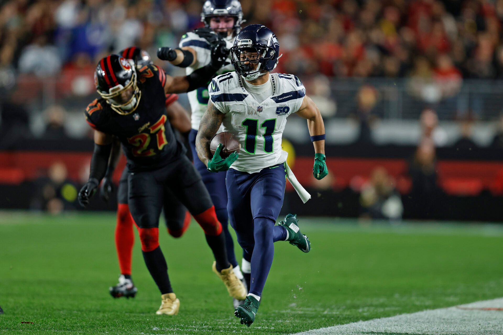 Seattle Seahawks wide receiver Jaxon Smith-Njigba (11) runs after a catch against the San Francisco 49ers during the first half at Levi's Stadium.