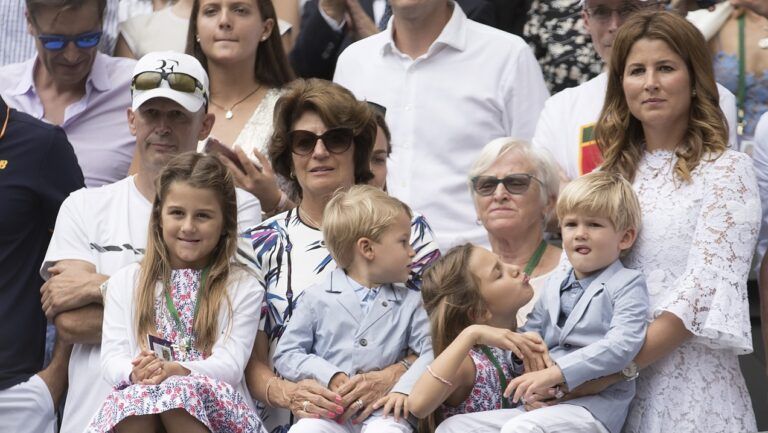 Charlene Riva Federer, Myla Rose Federer, Lenny Federer, Leo Federer, with their mother Mirka Federer and grandmother, Lynette Federer in attendance for the trophy presentation as their father, Roger Federer (SUI) defeated Marin Cilic (CRO) in the men's final match on day 13 at the All England Lawn Tennis and Croquet Club.