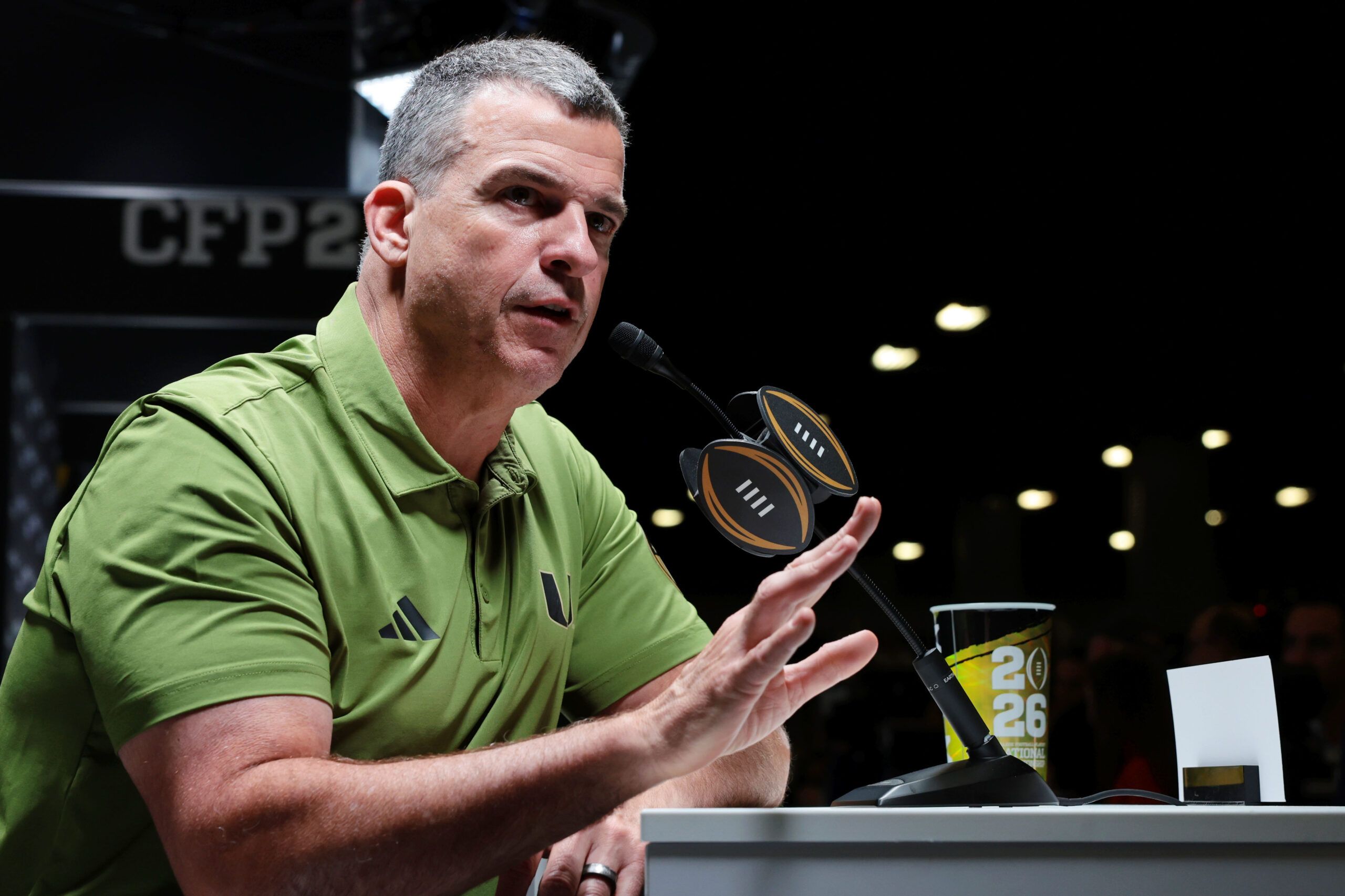 Miami Hurricanes head coach Mario Cristobal talks to the media during media day for the 2025 College Football Playoff National Championship at Miami Beach Convention Center.