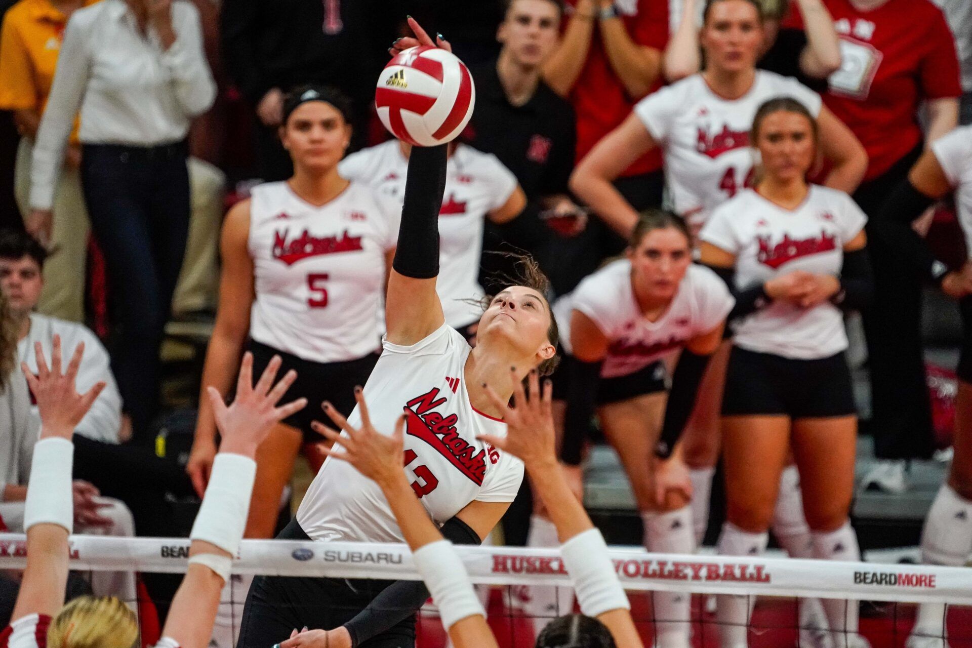 Nebraska Cornhuskers outside hitter Merritt Beason (13) attacks against the Wisconsin Badgers during the fourth set at the Bob Devaney Sports Center.