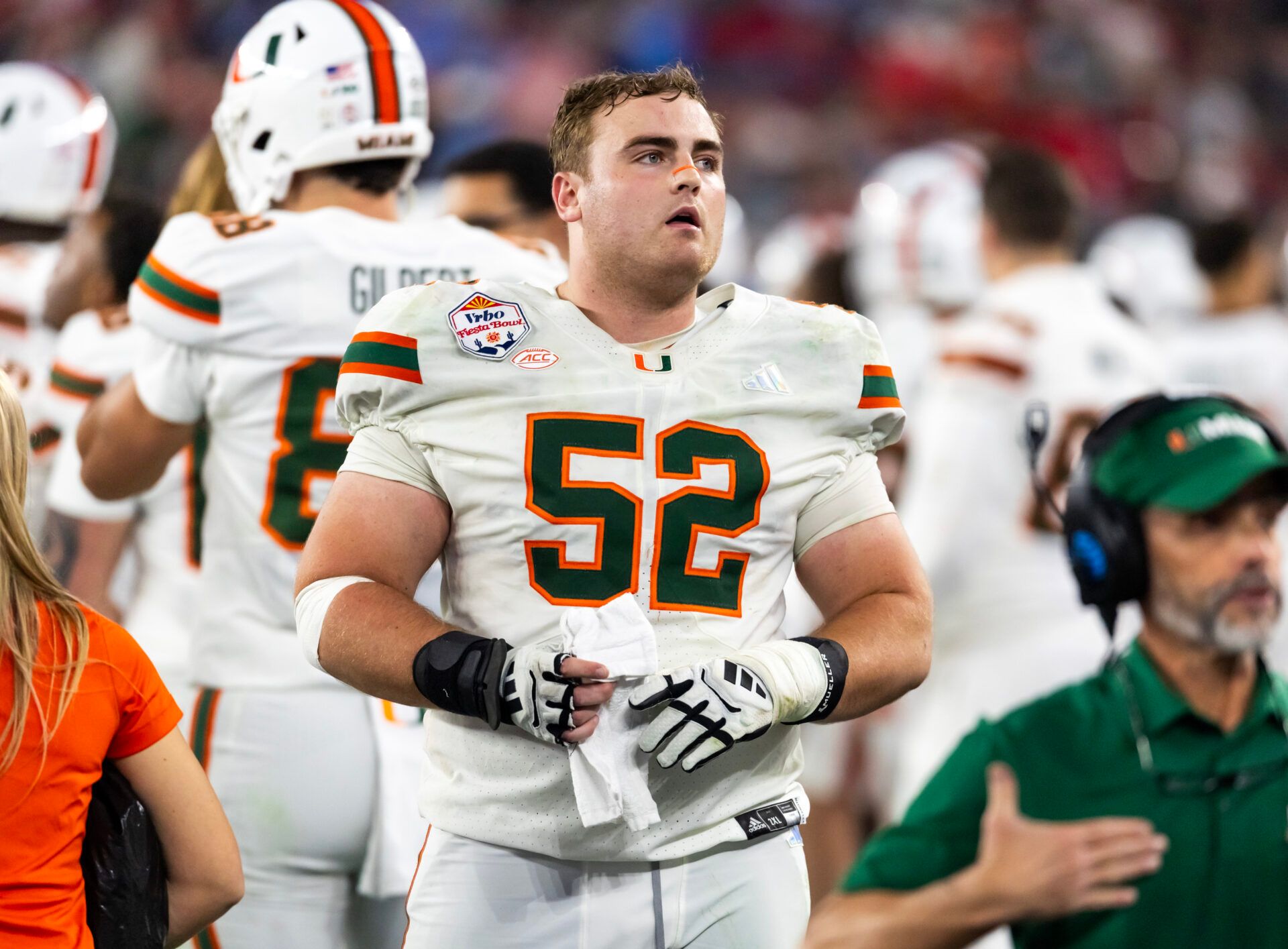 Miami Hurricanes offensive lineman James Brockermeyer (52) against the Mississippi Rebels during the 2026 Fiesta Bowl and semifinal game of the College Football Playoff at State Farm Stadium.