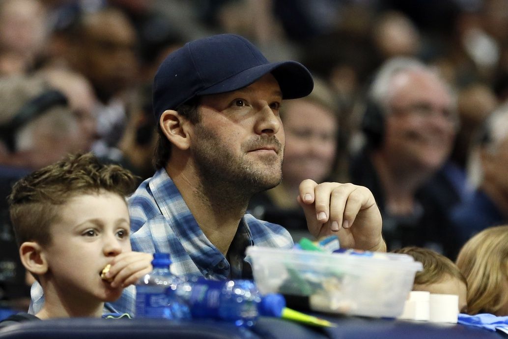 Dallas Cowboys former quarterback Tony Romo watches the game between the Dallas Mavericks and the New Orleans Pelicans at American Airlines Center.