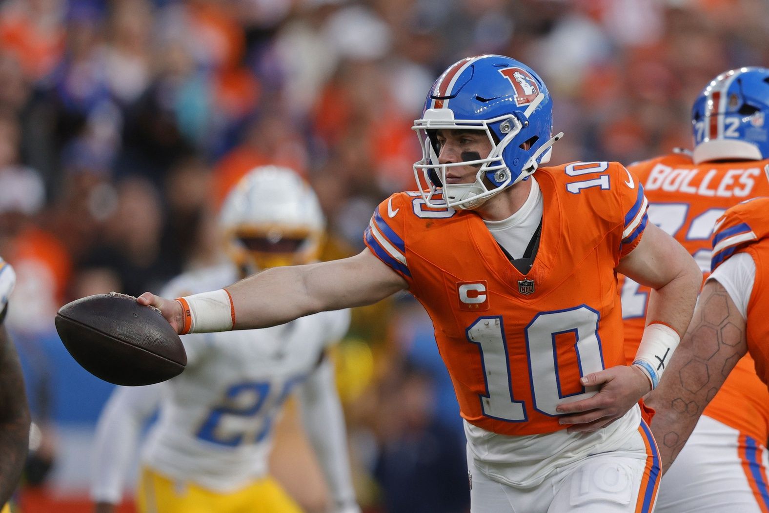 Denver Broncos quarterback Bo Nix (10) passes the ball during the second half against the Los Angeles Chargers at Empower Field at Mile High.