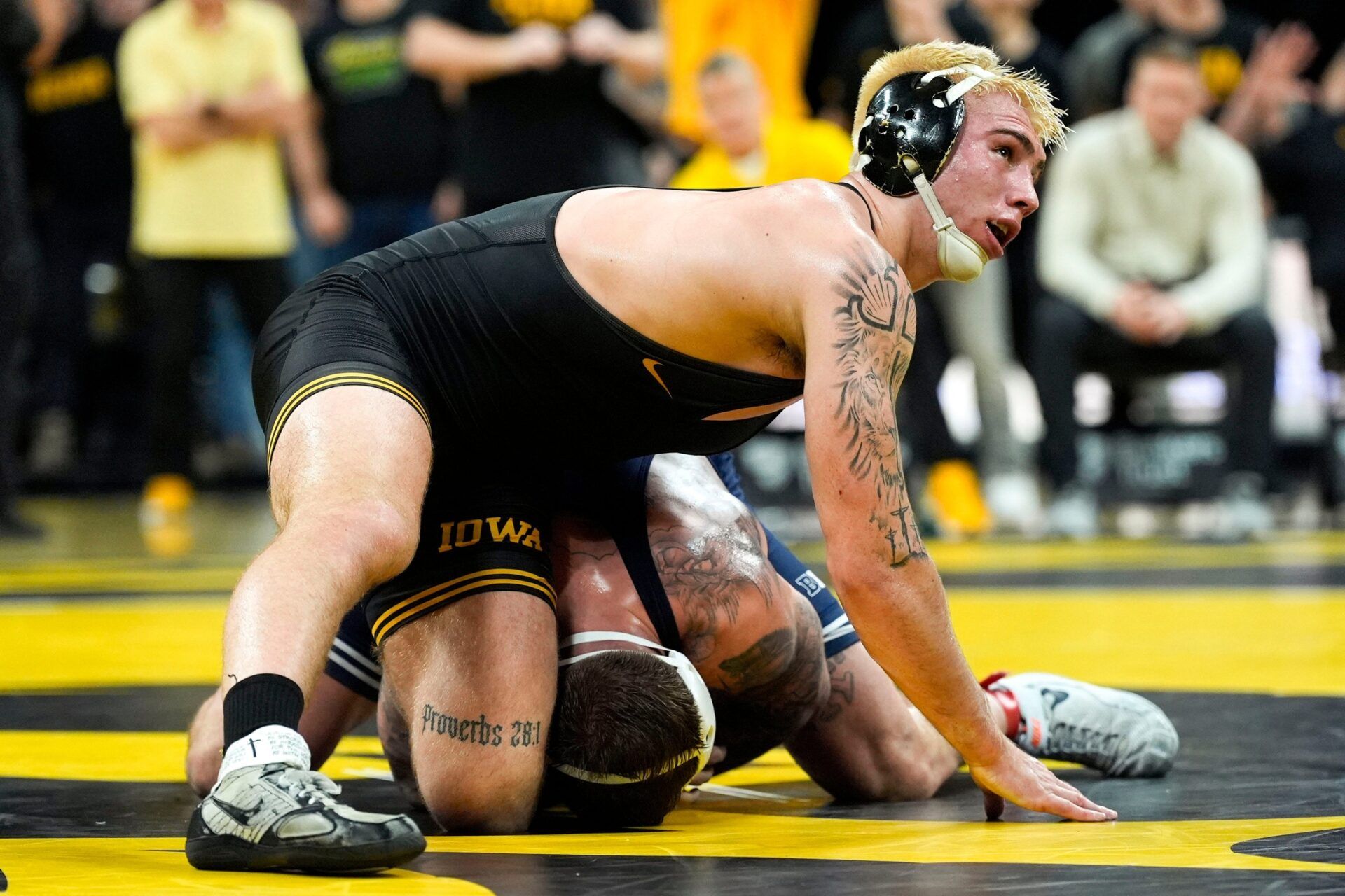 Iowa’s Angelo Ferrari wrestles Penn State’s Rocco Welsh during a 184-pound match Jan. 16, 2026 at Carver-Hawkeye Arena in Iowa City, Iowa.