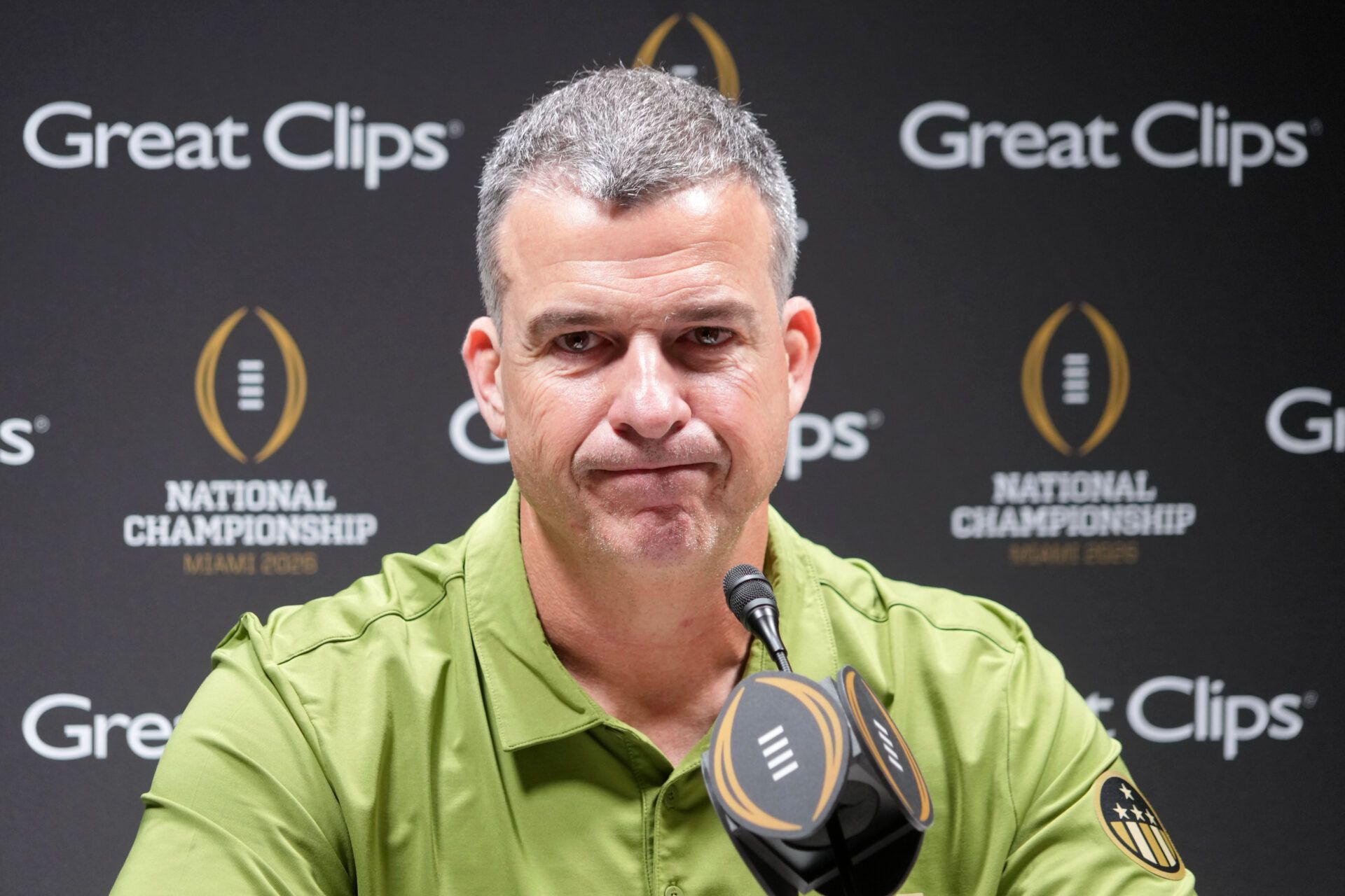 Miami Hurricanes head coach Mario Cristobal talks to the media during media day for the 2025 College Football Playoff National Championship at Miami Beach Convention Center.