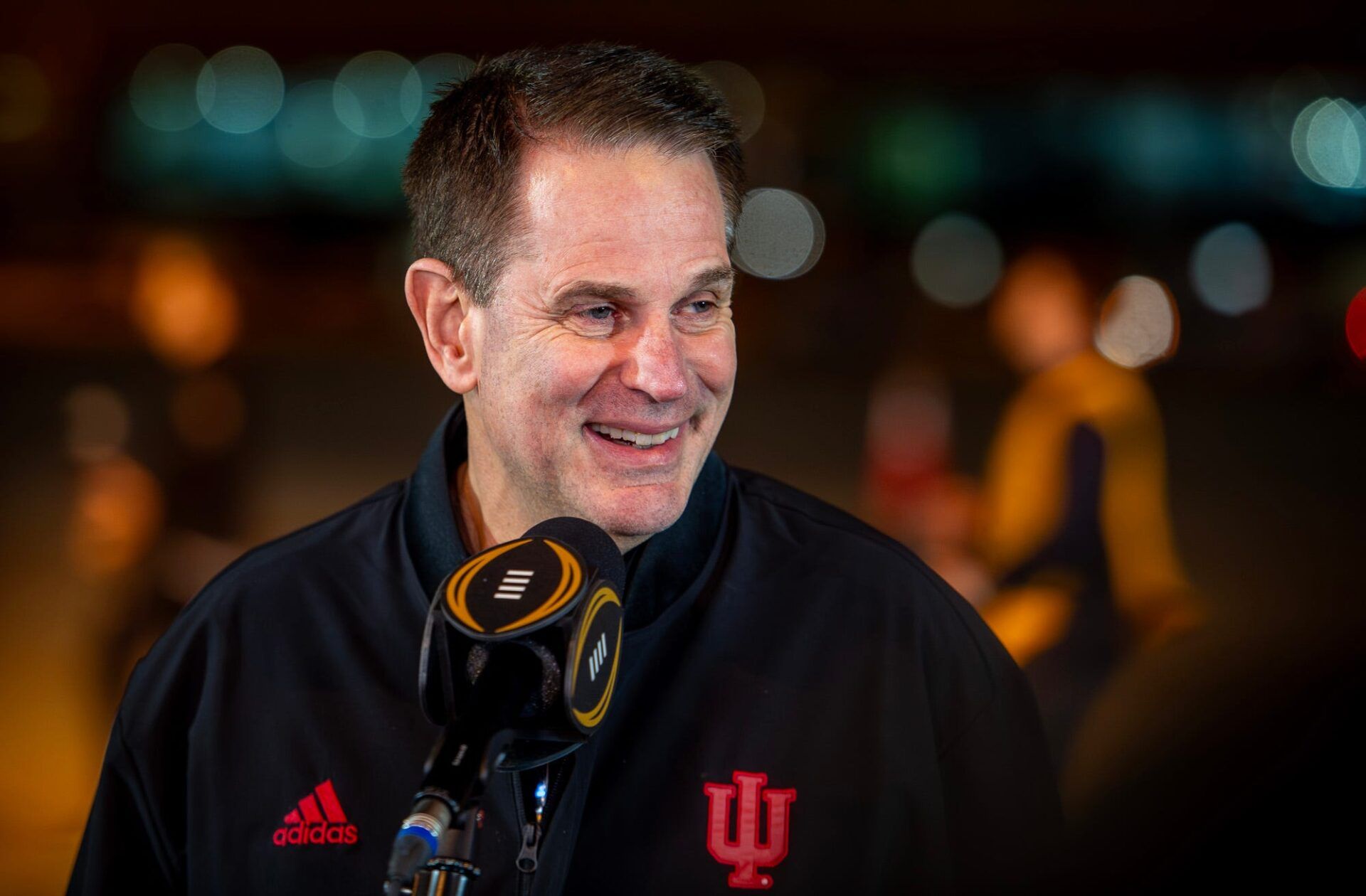 Indiana Head Coach Curt Cignetti speaks with the media as the Indiana Hoosiers football team arrives for the College Football Playoff at Miami International Airport on Friday, Jan. 16, 2026.