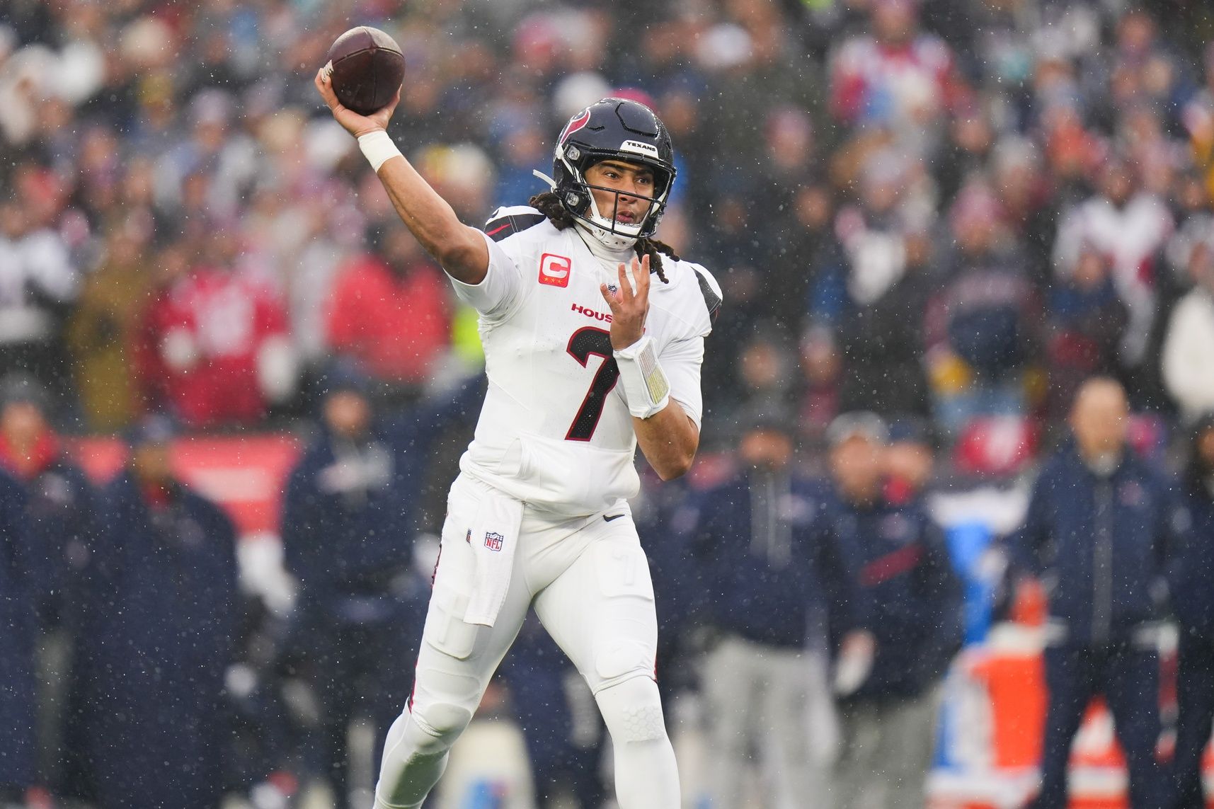 Houston Texans quarterback C.J. Stroud (7) throws in the first quarter against the New England Patriots in an AFC Divisional Round game at Gillette Stadium.