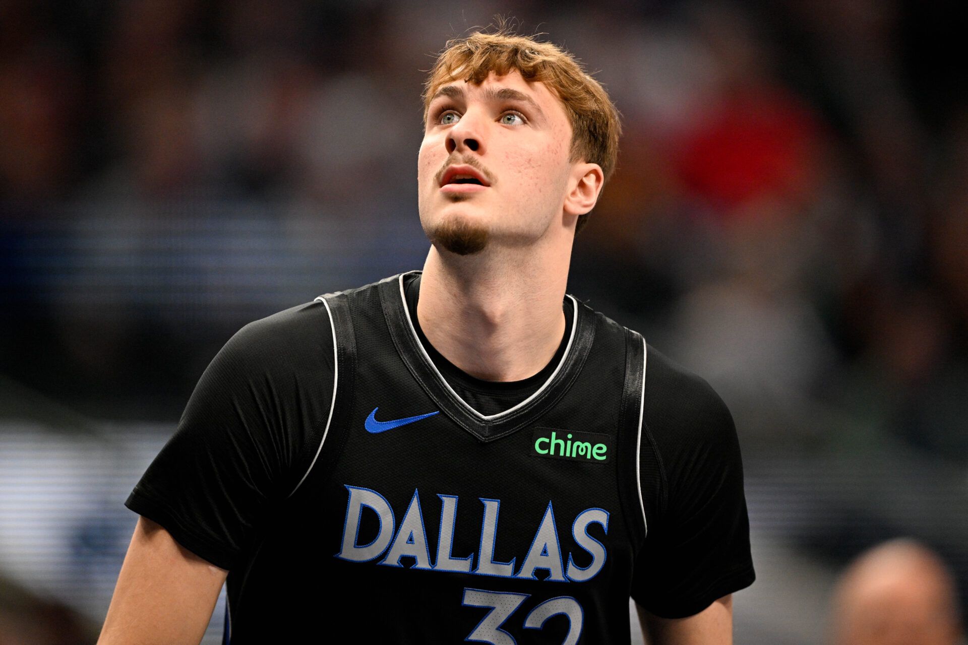 Dallas Mavericks forward Cooper Flagg (32) looks on during the game against the Denver Nuggets at the American Airlines Center.