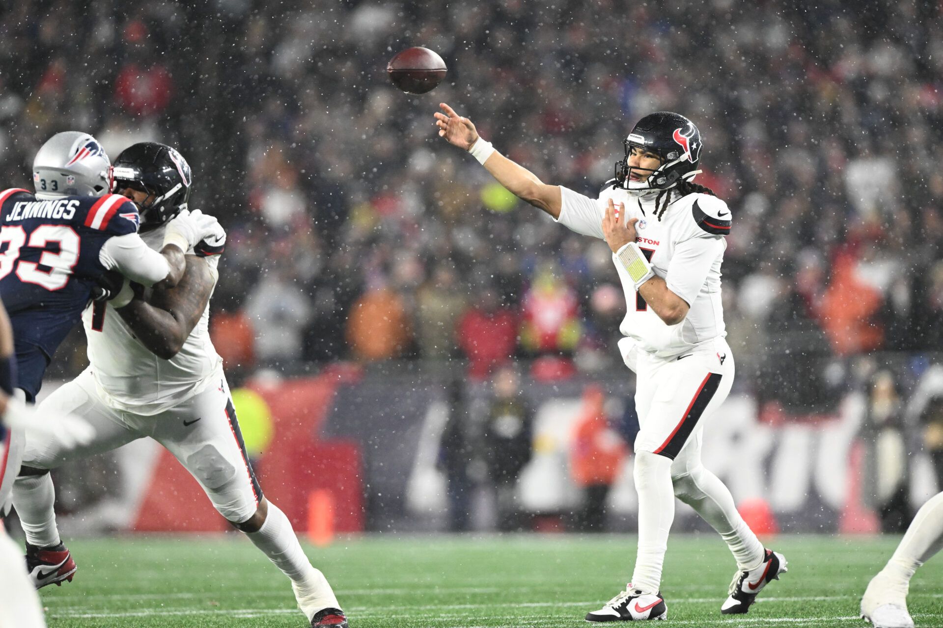 Houston Texans quarterback C.J. Stroud (7) throws the ball in the third quarter against the New England Patriots in an AFC Divisional Round game at Gillette Stadium.
