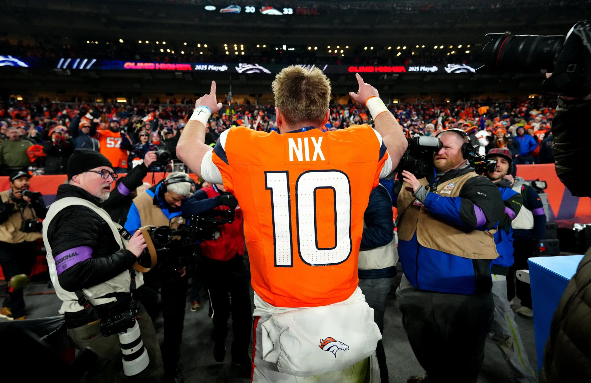 Denver Broncos quarterback Bo Nix (10) celebrates after winning an AFC Divisional Round playoff game against the Buffalo Bills at Empower Field at Mile High.