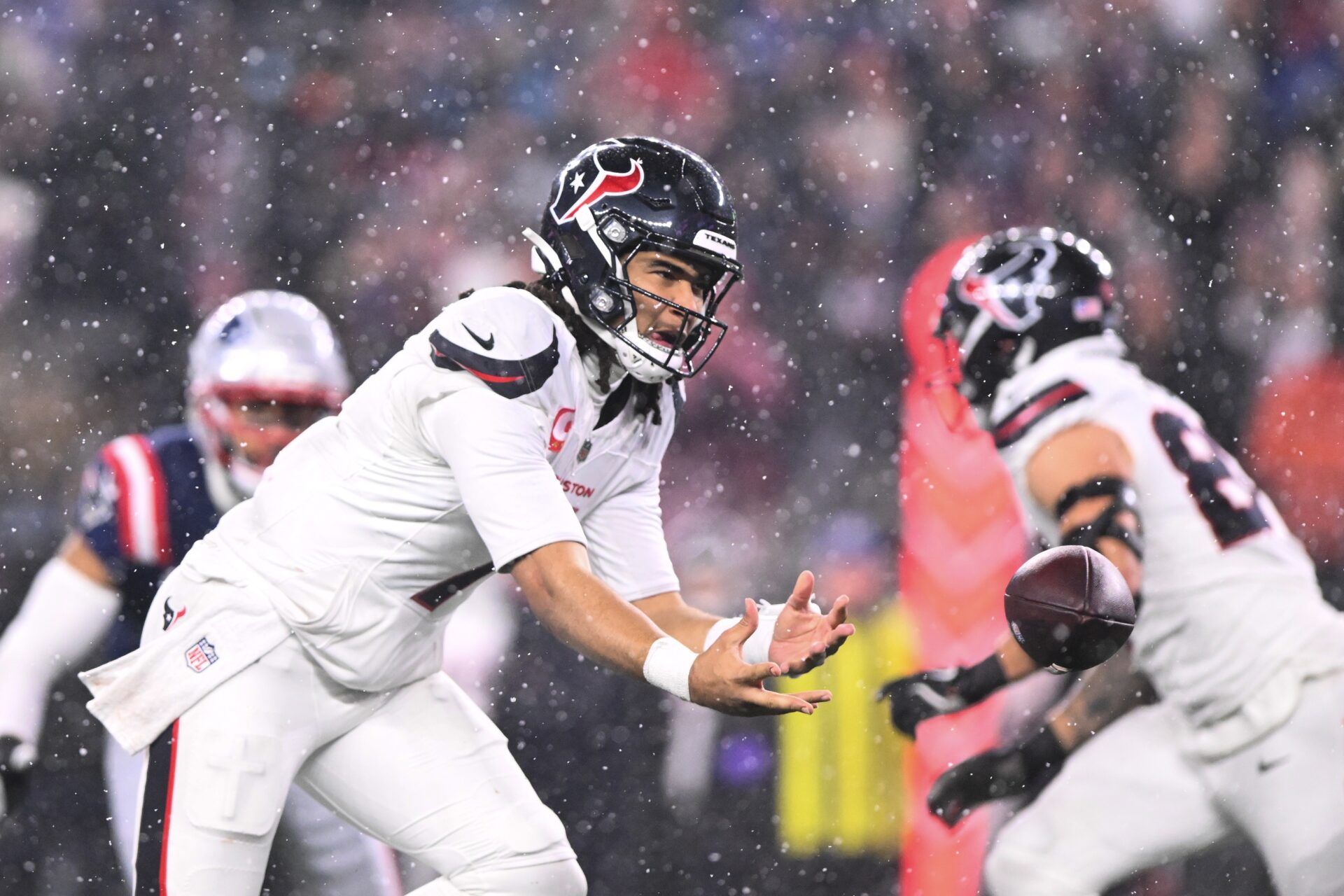 Houston Texans quarterback C.J. Stroud (7) tosses the ball in the fourth quarter against the New England Patriots in an AFC Divisional Round game at Gillette Stadium.