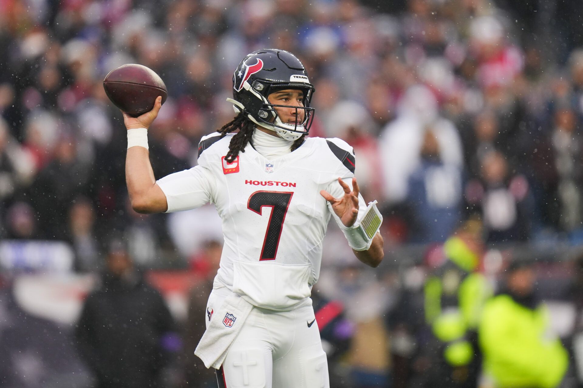 Houston Texans quarterback C.J. Stroud (7) throws in the first quarter in an AFC Divisional Round game against the New England Patriots at Gillette Stadium.