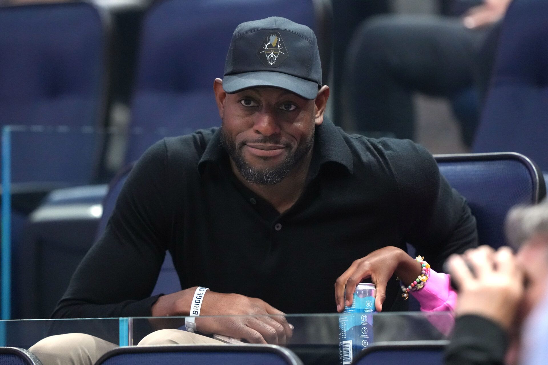 Golden State Warriors former player Andre Iguodala sits in the stand during the first quarter of the game between the Golden State Valkyries and the Indiana Fever at Chase Center.