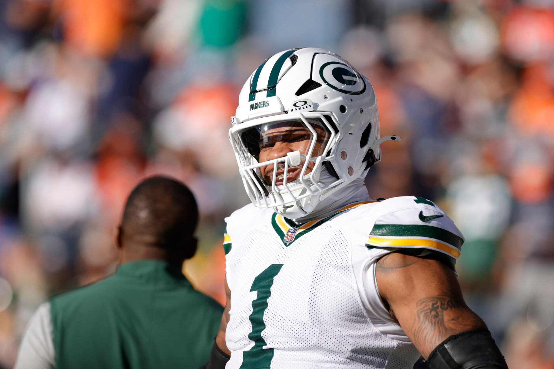 Green Bay Packers defensive end Micah Parsons (1) warms up before a game against the Denver Broncos at Empower Field at Mile High.