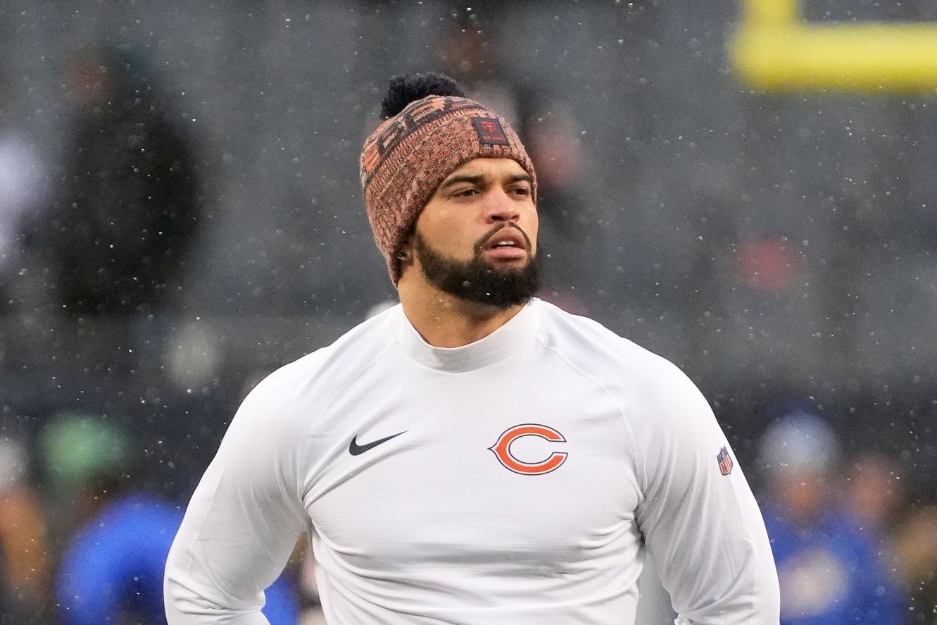 Chicago Bears quarterback Caleb Williams (18) looks on during warmups before an NFC Divisional Round game against the Los Angeles Rams at Soldier Field.