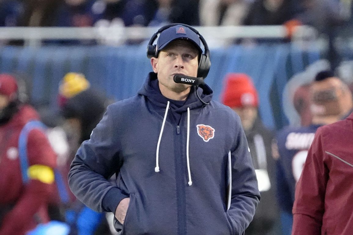 Chicago Bears head coach Ben Johnson looks on from the sideline against the Detroit Lions during the first half at Soldier Field.