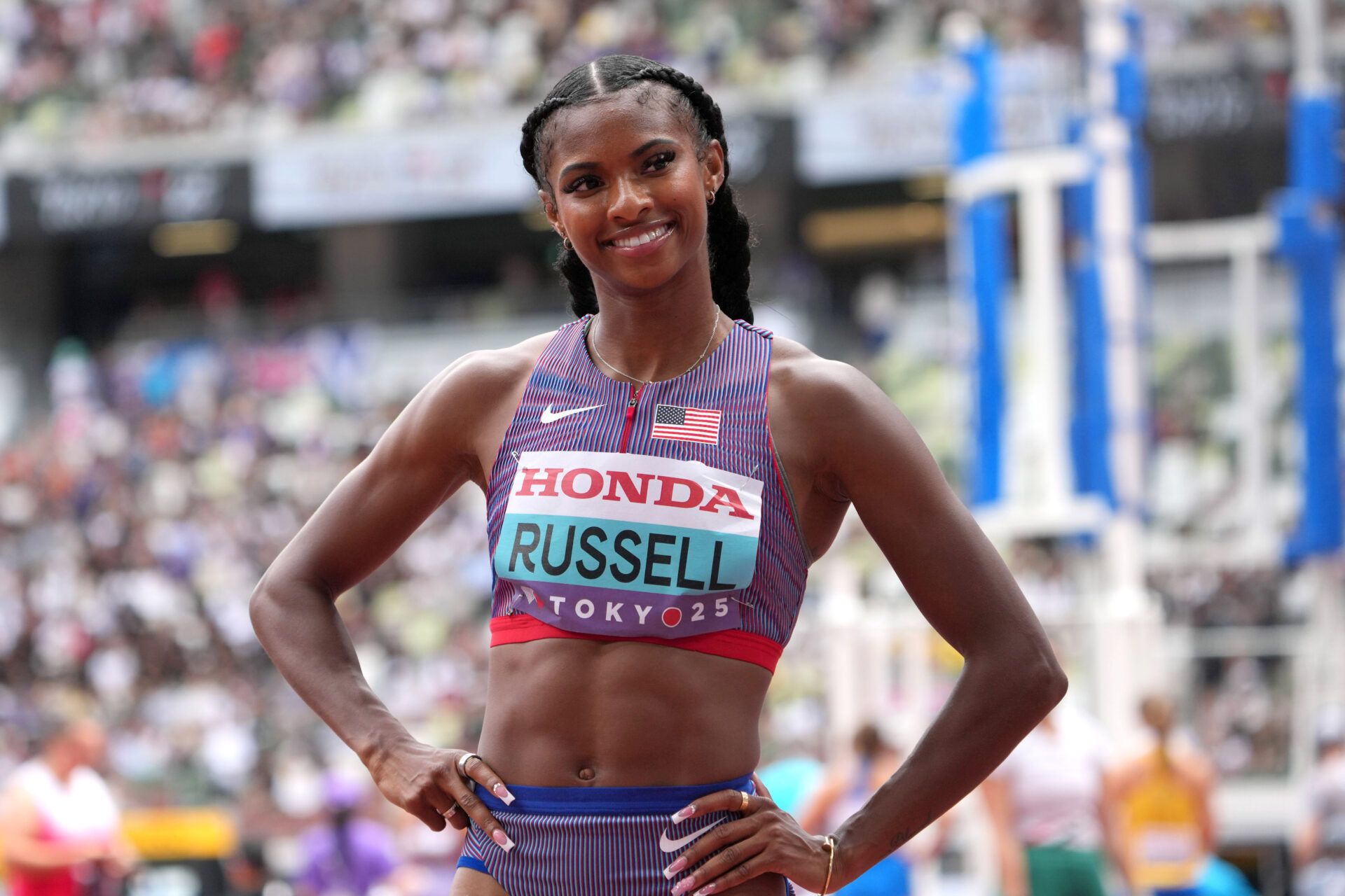 Masai Russell (USA) poses after winning women's 100m hurdles heat in 12.53 during the World Athletics Championships at National Stadium.