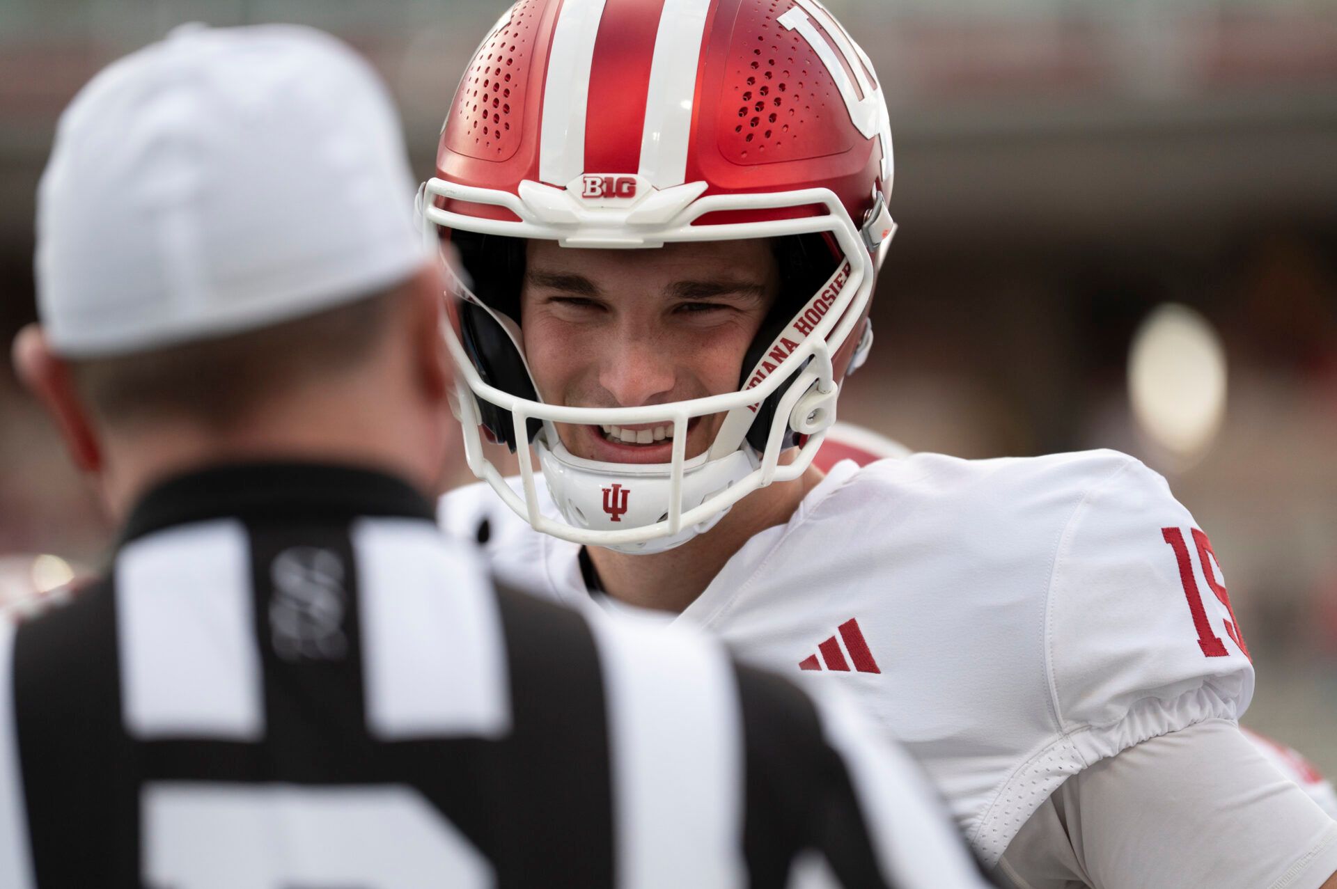 Indiana Hoosiers quarterback Fernando Mendoza (15) speaks with a referee before the game against the Maryland Terrapins at SECU Stadium.