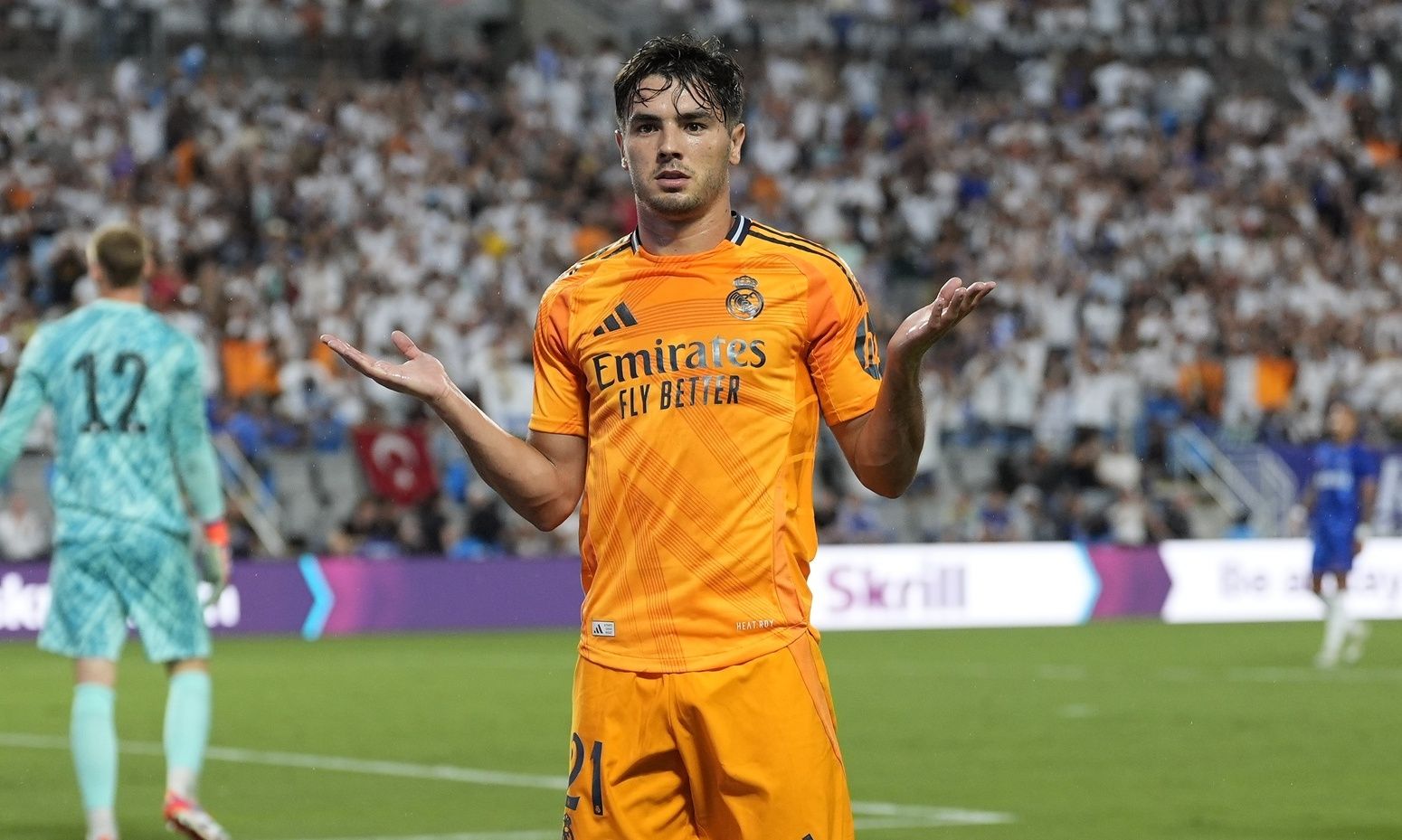 Real Madrid forward Brahim Diaz (21) reacts to his goal against Chelsea during the first half at Bank of America Stadium.