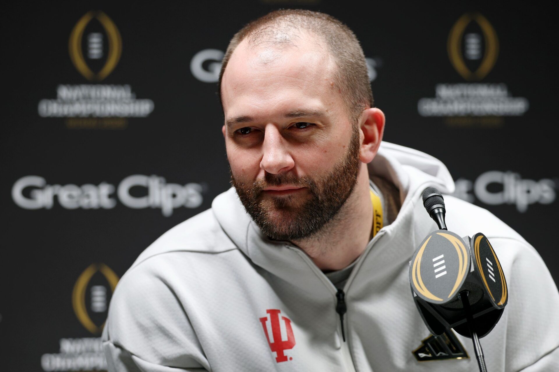 Indiana Hoosiers offensive coordinator Mike Shanahan talks to the media during media day for the 2025 College Football Playoff National Championship at Miami Beach Convention Center.