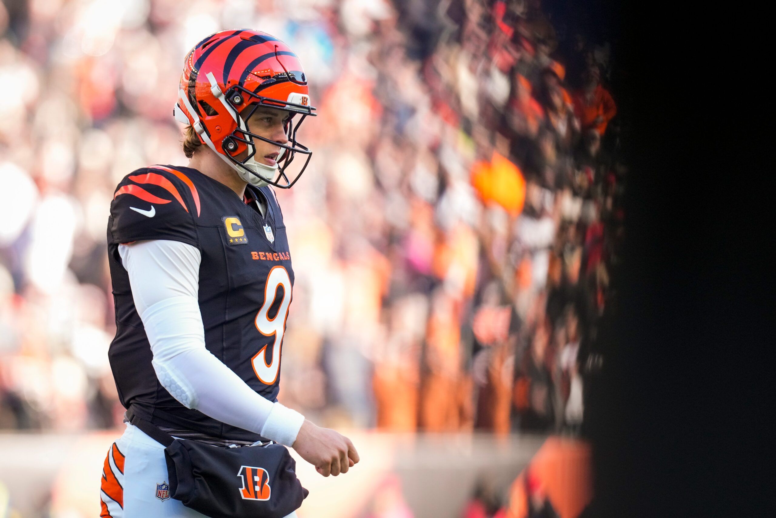 Cincinnati Bengals quarterback Joe Burrow (9) returns to the sideline after a fumbled ball is returned for a touchdown in the second quarter of the NFL Week 18 game between the Cincinnati Bengals and the Cleveland Browns at Paycor Stadium in Downtown Cincinnati on Sunday, Jan. 4, 2026.
