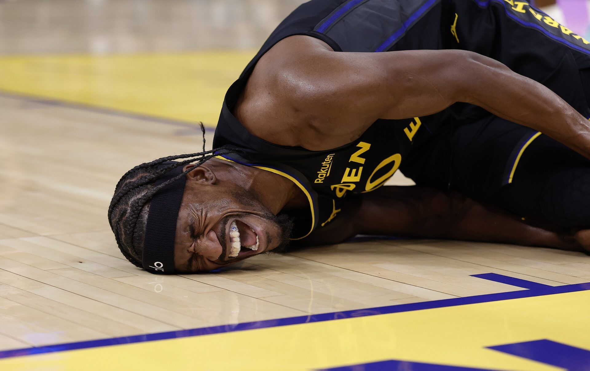 Golden State Warriors forward Jimmy Butler III (10)he goes down with a knee injury during the third quarter against the Miami Heat at Chase Center.