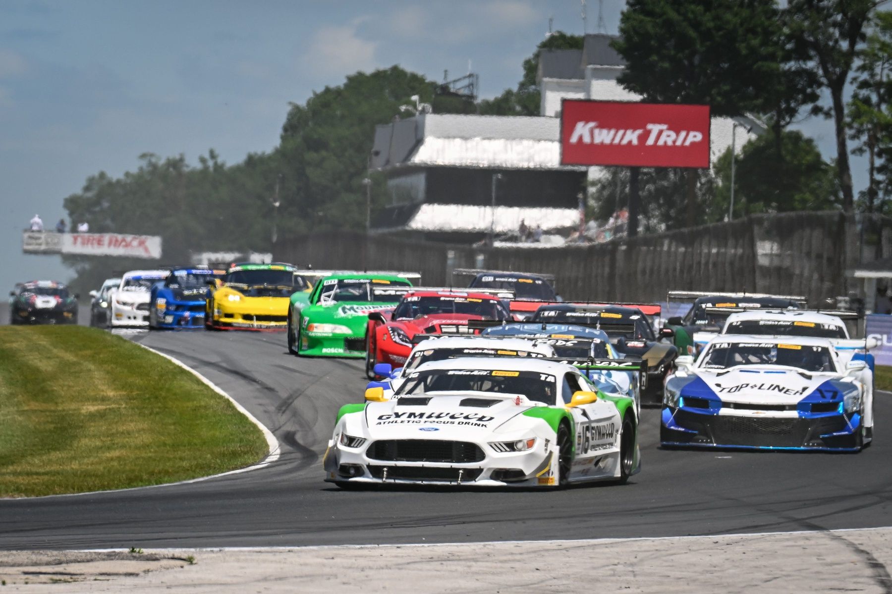 Chris Dyson leads the field into Turn 1 on the first lap of the Cheese Capital Cup Trans Am race on Saturday, June 28, 2025, at Road America in Elkhart Lake, Wisconsin.