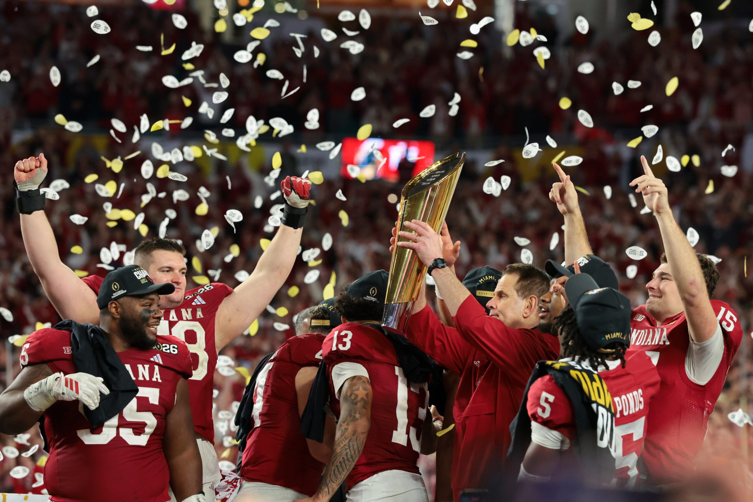 Indiana Hoosiers head coach Curt Cignetti lifts the trophy after the College Football Playoff National Championship game against the Miami Hurricanes at Hard Rock Stadium.