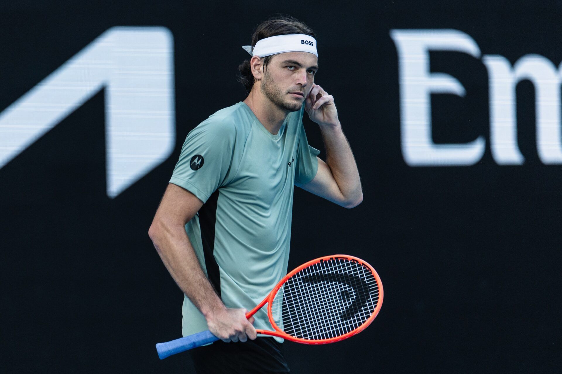 Taylor Fritz of United States in action against Valentin Royer of France in the first round of the mens singles at the Australian Open at John Cain Arena in Melbourne Park.
