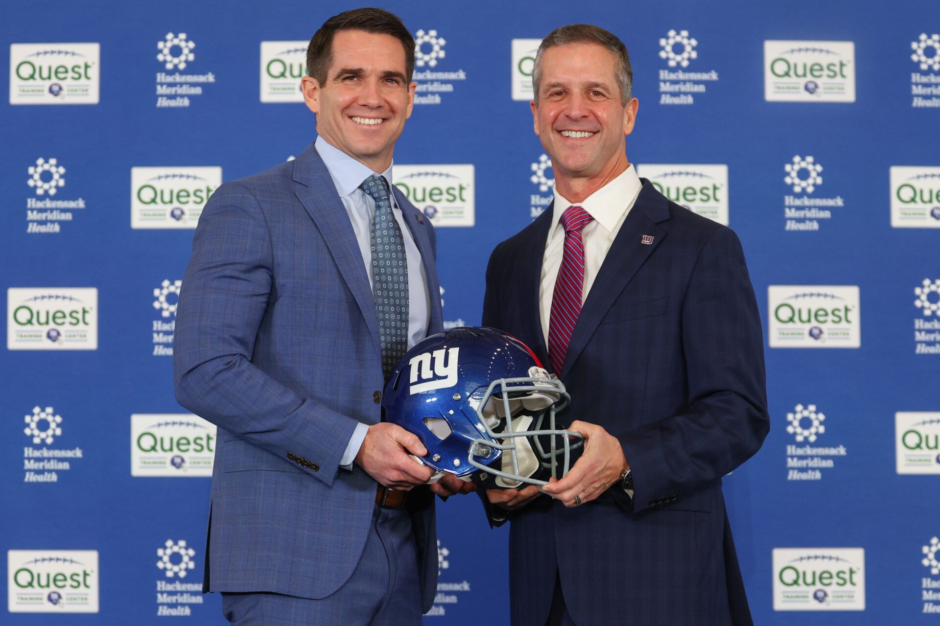 New York Giants general manager Joe Schoen and head coach John Harbaugh pose after the press conference announcing Harbaughs hiring at Quest Diagnostics Training Center.