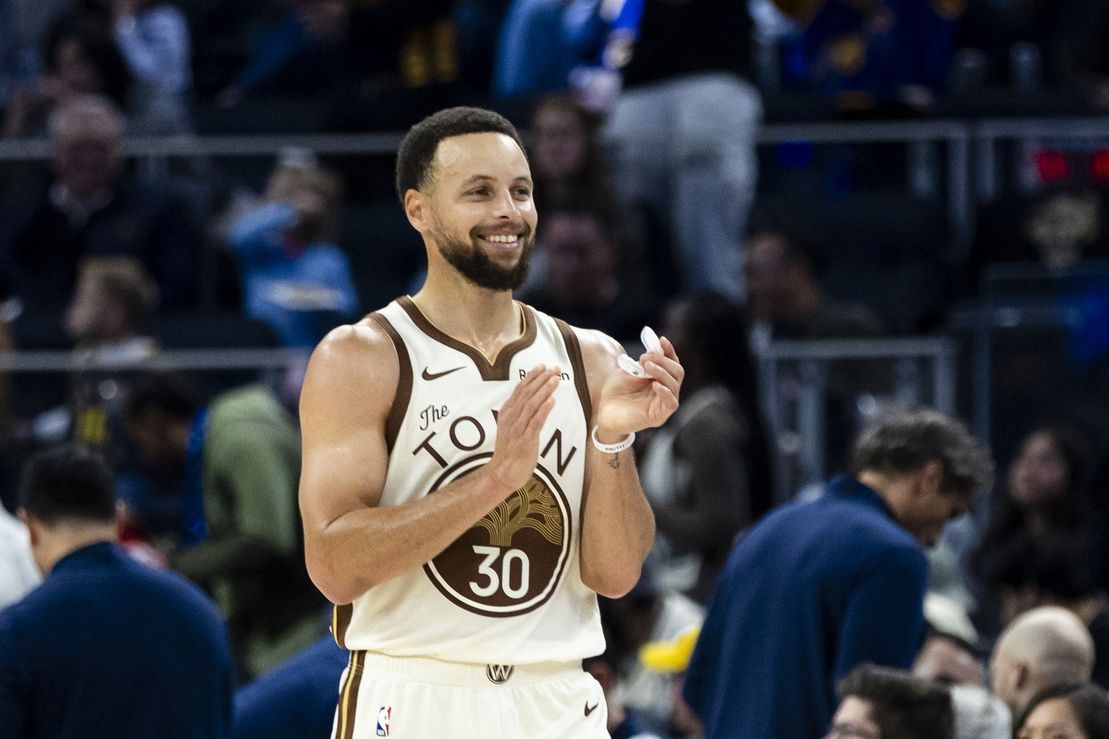Golden State Warriors guard Stephen Curry (30) reacts during the third quarter against the Charlotte Hornets at Chase Center.