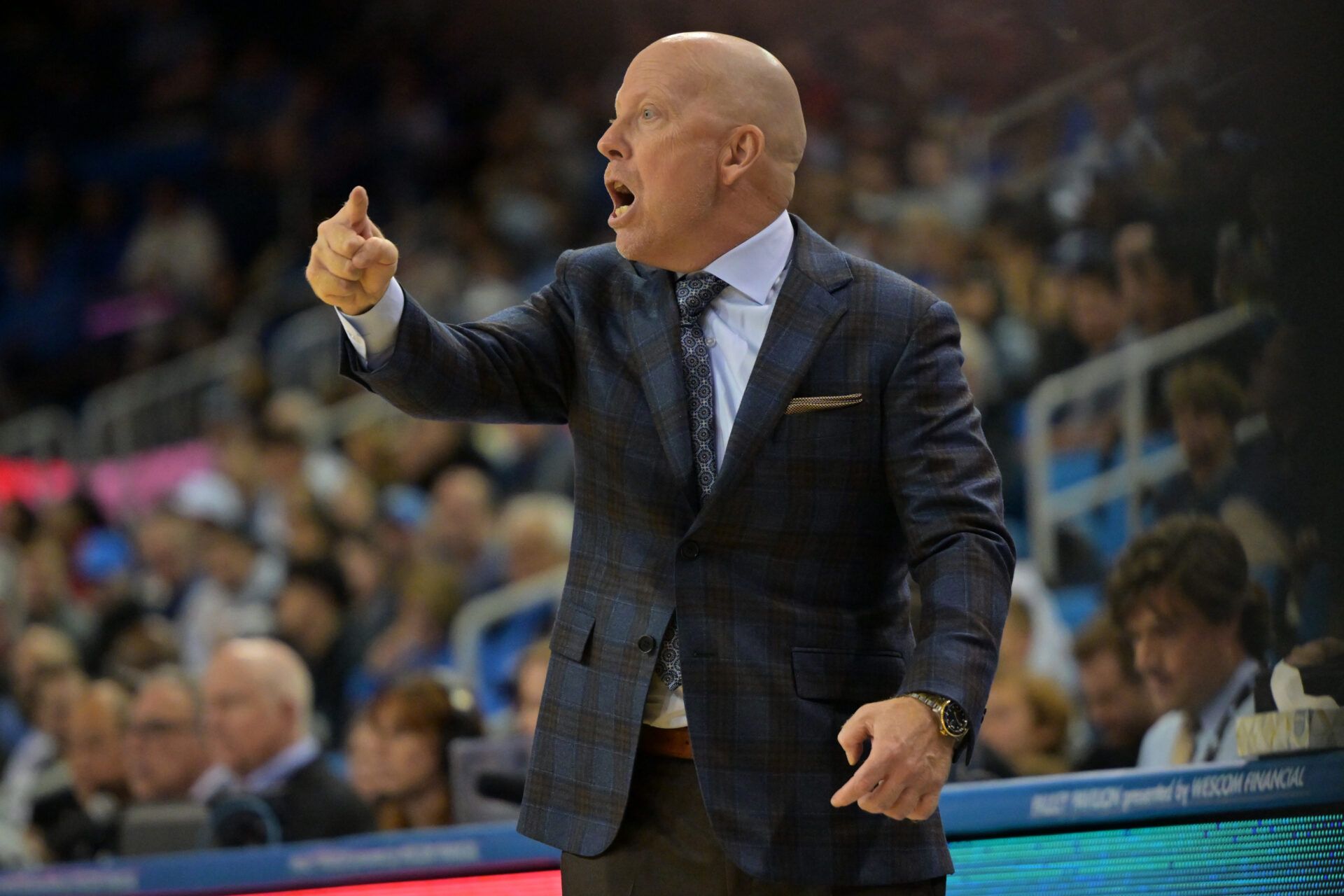 UCLA Bruins head coach Mick Cronin instructs players on the court during the second half against the Maryland Terrapins at Pauley Pavilion presented by Wescom Financial.