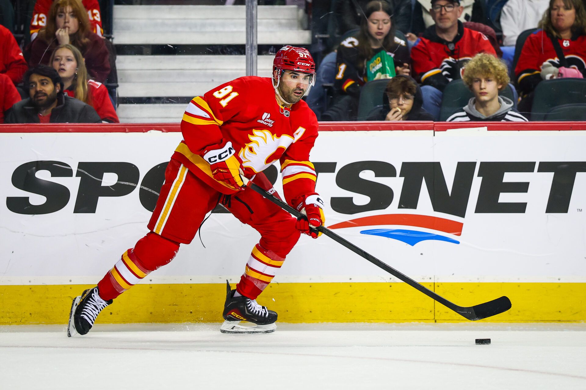Calgary Flames center Nazem Kadri (91) controls the puck at Scotiabank Saddledome.