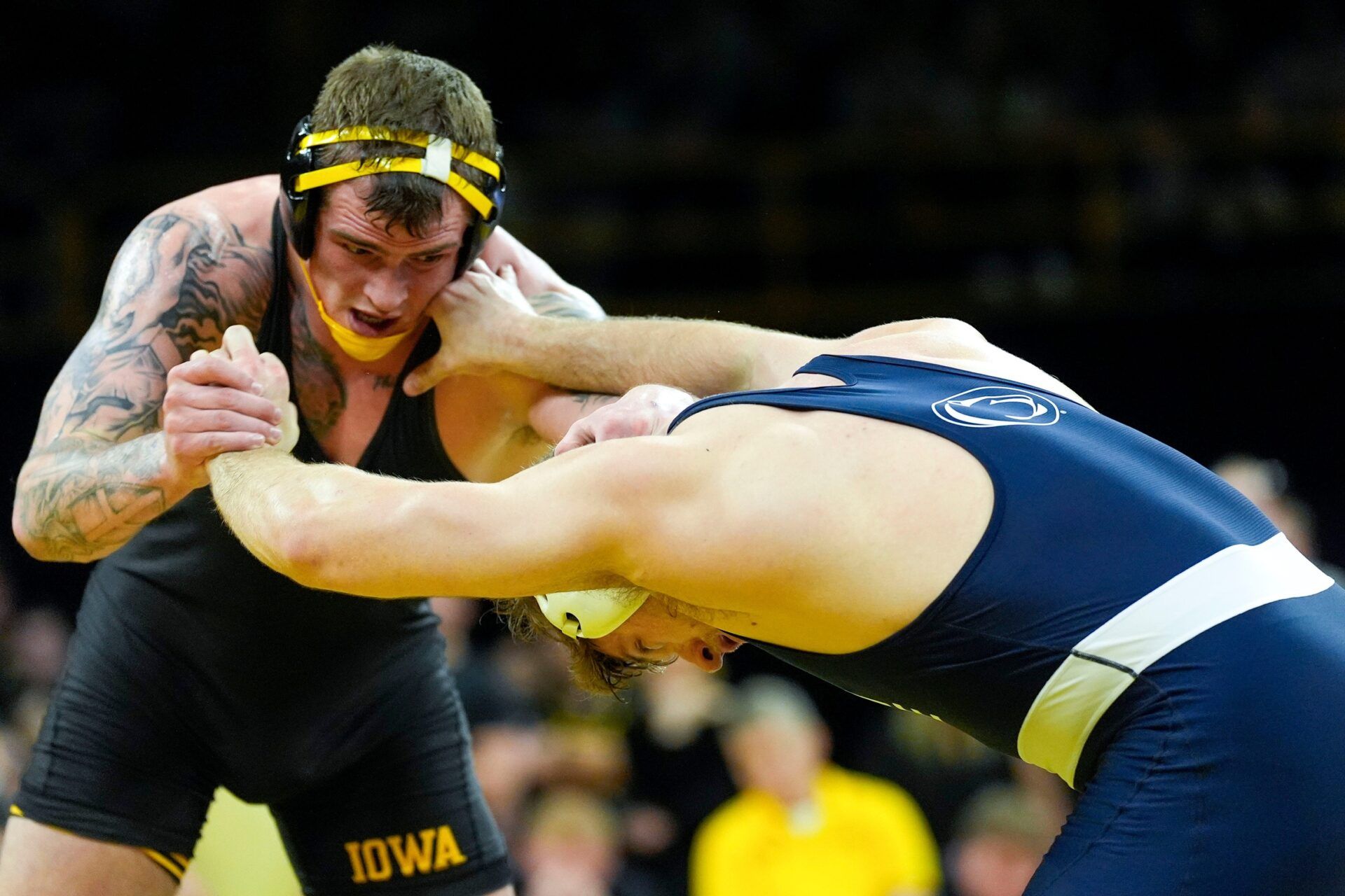 Iowa’s Ben Kueter wrestles Penn State’s Cole Mirasola in a 285-pound match Jan. 16, 2026 at Carver-Hawkeye Arena in Iowa City, Iowa.