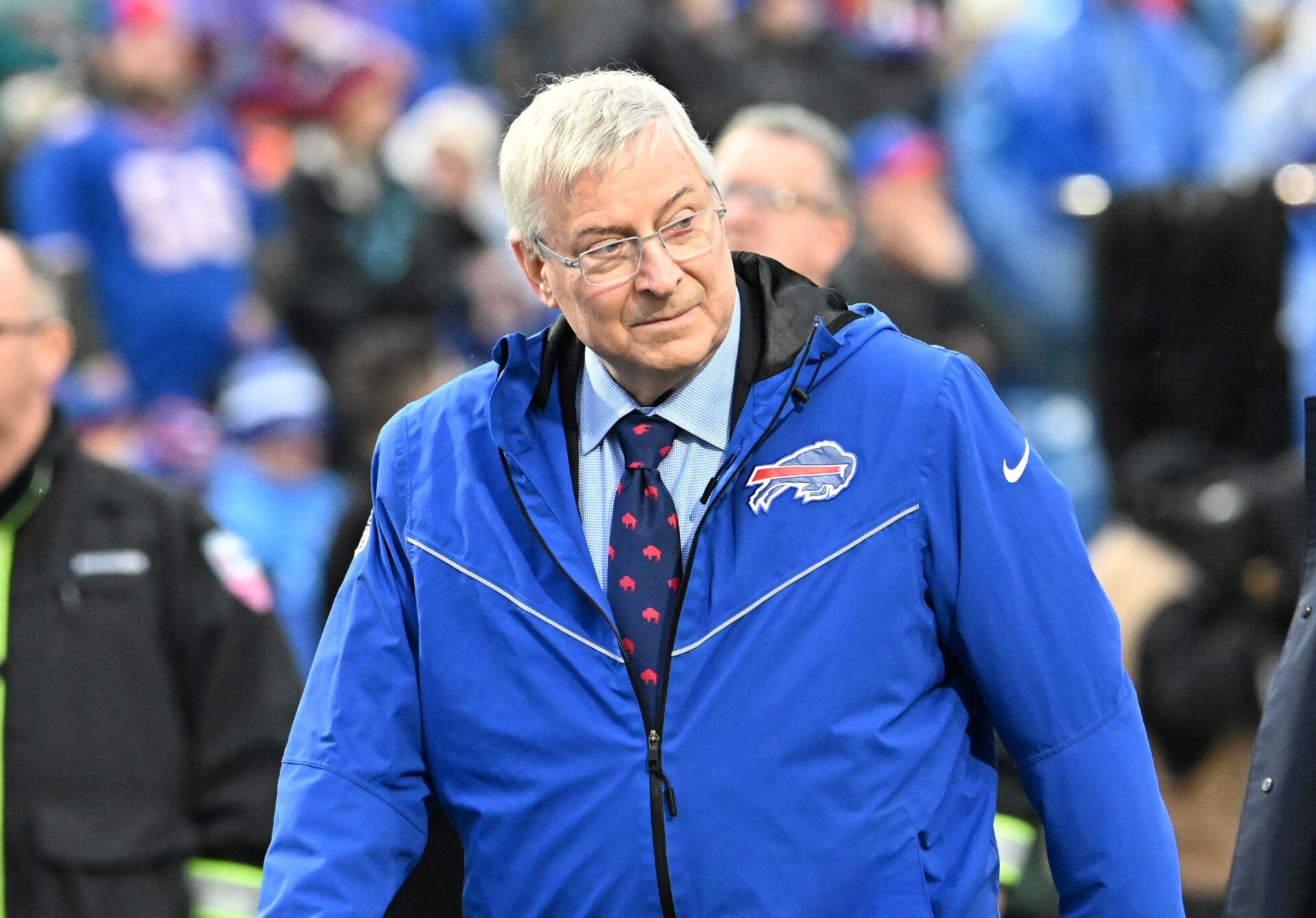 Buffalo Bills owner Terry Pegula walks with the team before a game against the New York Jets at Highmark Stadium.