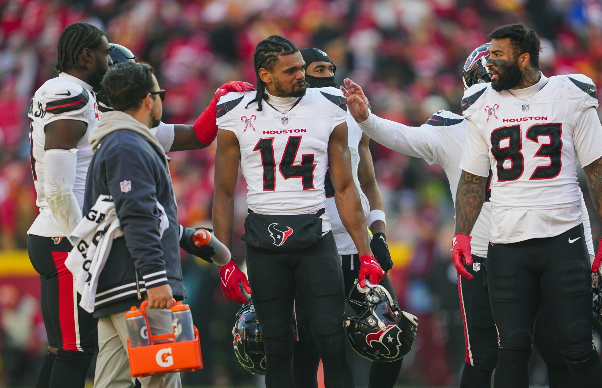 Houston Texans wide receiver Jared Wayne (14) reacts after an injury to wide receiver Tank Dell (not pictured) during the second half against the Kansas City Chiefs at GEHA Field at Arrowhead Stadium.