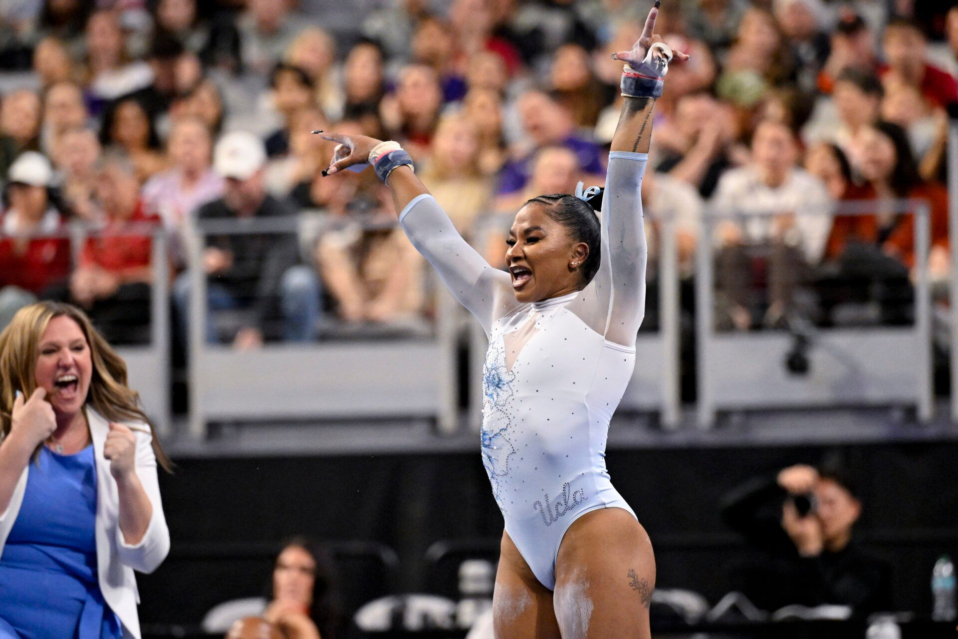UCLA Bruins gymnast Jordan Chiles performs on uneven bars during the 2025 Women's National Gymnastics Championship at Dickies Arena.